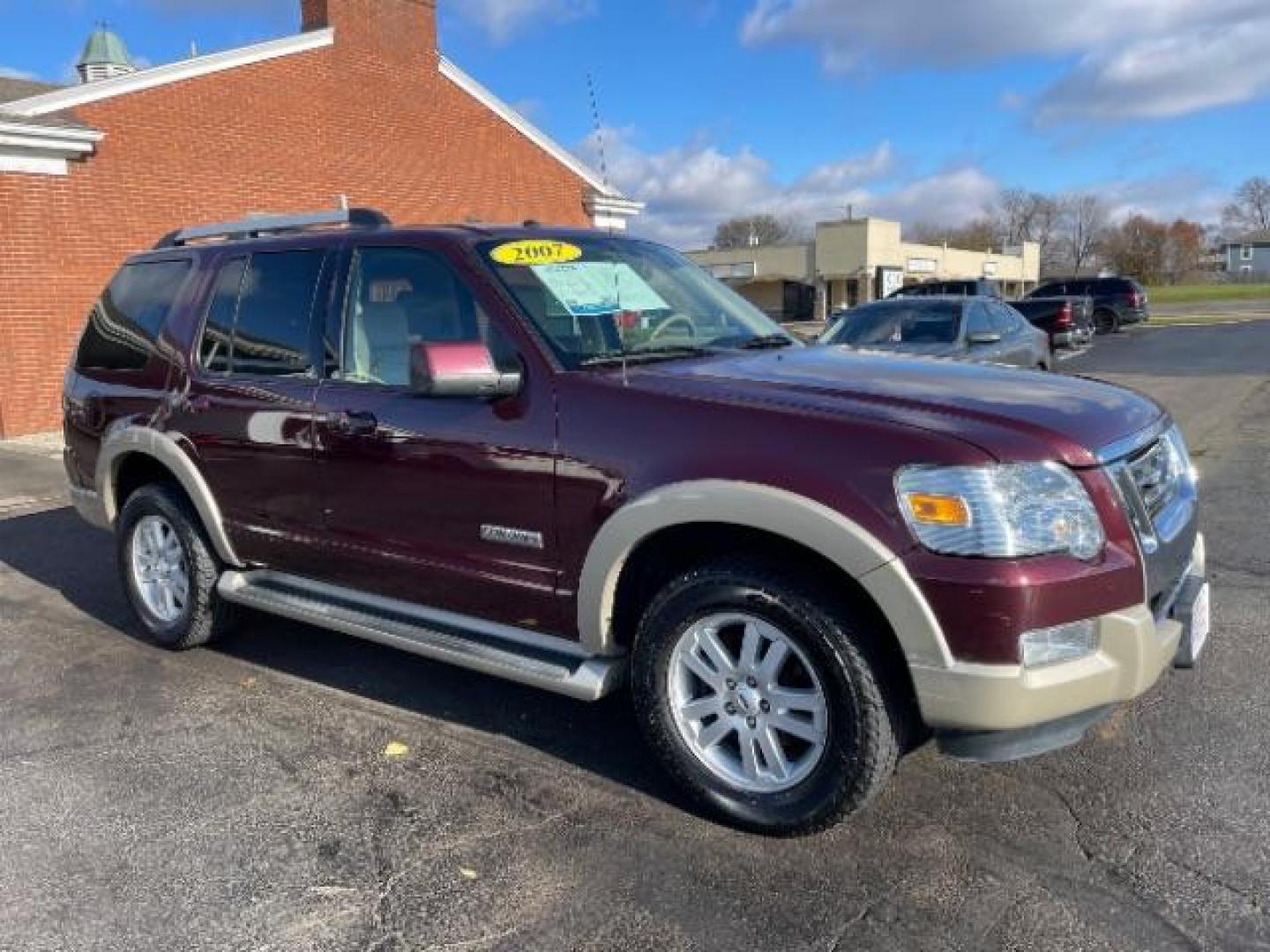 2007 Dark Cherry Metallic Ford Explorer Eddie Bauer 4.0L 4WD (1FMEU74E77U) with an 4.0L V6 SOHC 16V engine, 5-Speed Automatic transmission, located at 4508 South Dixie Dr, Moraine, OH, 45439, (937) 908-9800, 39.689976, -84.218452 - Photo#0