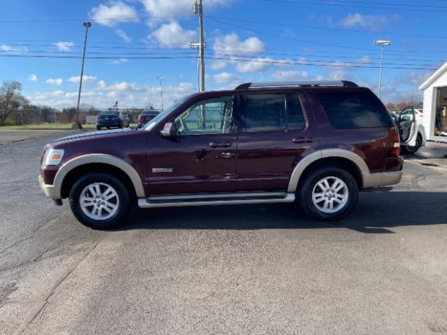 2007 Dark Cherry Metallic Ford Explorer Eddie Bauer 4.0L 4WD (1FMEU74E77U) with an 4.0L V6 SOHC 16V engine, 5-Speed Automatic transmission, located at 4508 South Dixie Dr, Moraine, OH, 45439, (937) 908-9800, 39.689976, -84.218452 - Photo#3