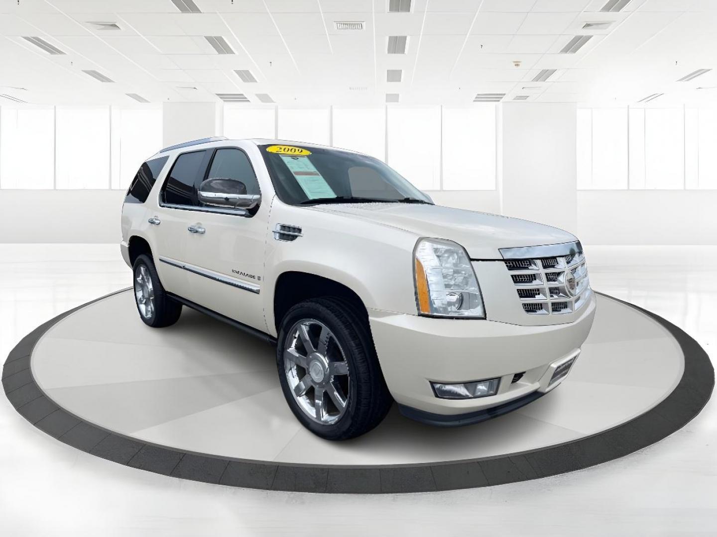 2009 White Diamond Cadillac Escalade AWD (1GYFK23239R) with an 6.2L V8 OHV 16V FFV engine, 6-Speed Automatic transmission, located at 1184 Kauffman Ave, Fairborn, OH, 45324, (937) 908-9800, 39.807072, -84.030914 - Third Row - Photo#0