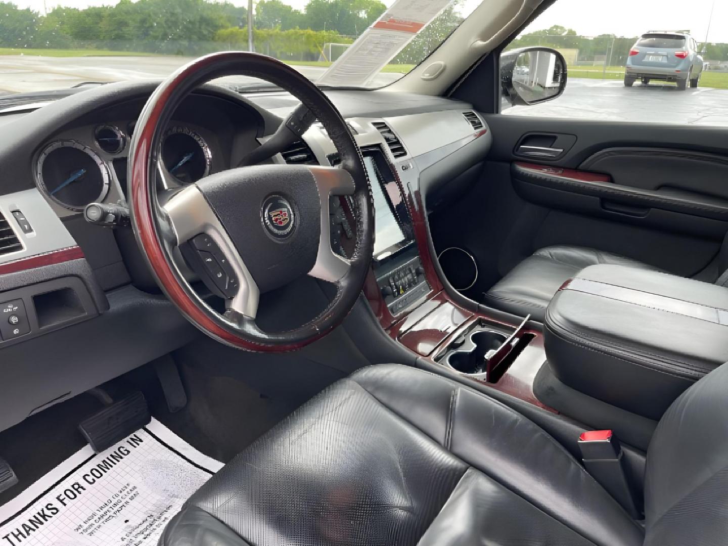 2009 White Diamond Cadillac Escalade AWD (1GYFK23239R) with an 6.2L V8 OHV 16V FFV engine, 6-Speed Automatic transmission, located at 1184 Kauffman Ave, Fairborn, OH, 45324, (937) 908-9800, 39.807072, -84.030914 - Third Row - Photo#6