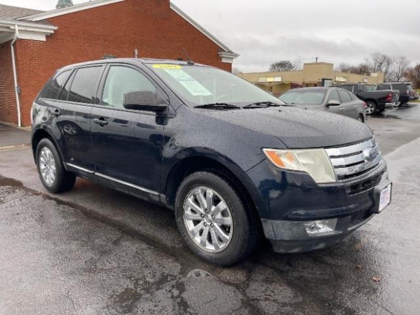 2009 Black Ford Edge SEL FWD (2FMDK38C29B) with an 3.5L V6 DOHC 24V engine, 6-Speed Automatic transmission, located at 1230 East Main St, Xenia, OH, 45385, (937) 908-9800, 39.688026, -83.910172 - Photo#0