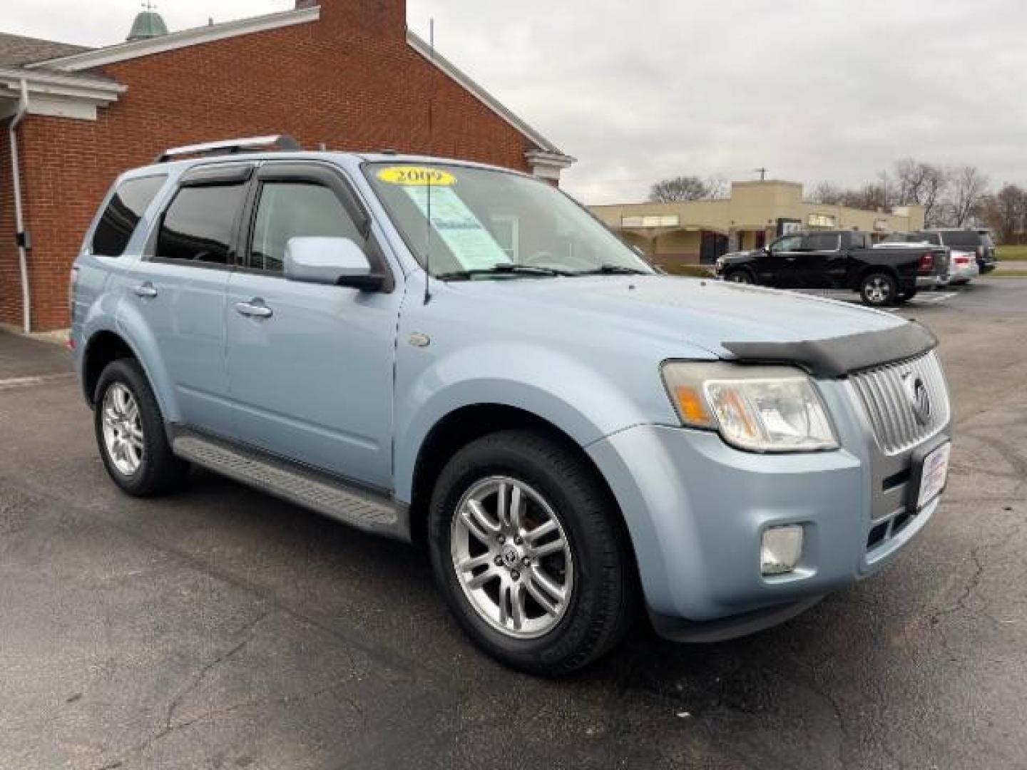 2009 Light Ice Blue Mercury Mariner Premier V6 2WD (4M2CU87G09K) , 6-Speed Automatic transmission, located at 401 Woodman Dr, Riverside, OH, 45431, (937) 908-9800, 39.760899, -84.123421 - Photo#0