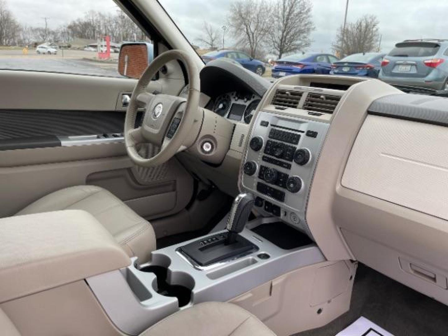 2009 Light Ice Blue Mercury Mariner Premier V6 2WD (4M2CU87G09K) , 6-Speed Automatic transmission, located at 401 Woodman Dr, Riverside, OH, 45431, (937) 908-9800, 39.760899, -84.123421 - Photo#8