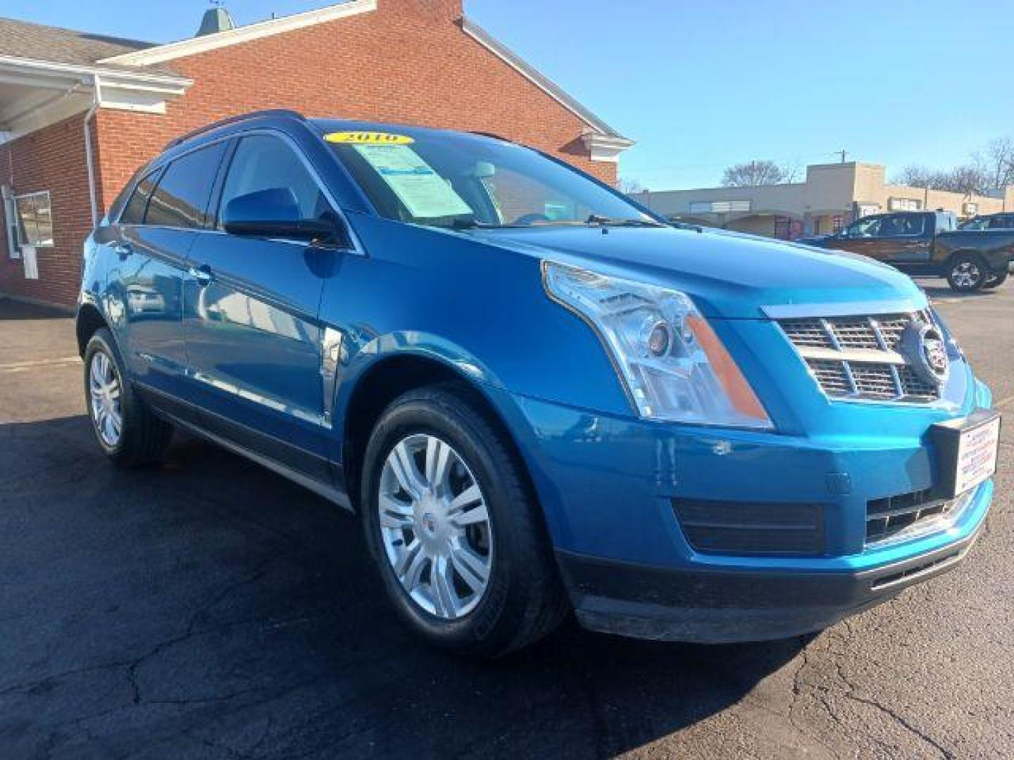 2010 Caribbean Blue Cadillac SRX Base (3GYFNGEY1AS) with an 3.0L V6 DOHC 24V engine, 6-Speed Automatic transmission, located at 1230 East Main St, Xenia, OH, 45385, (937) 908-9800, 39.688026, -83.910172 - Photo#0