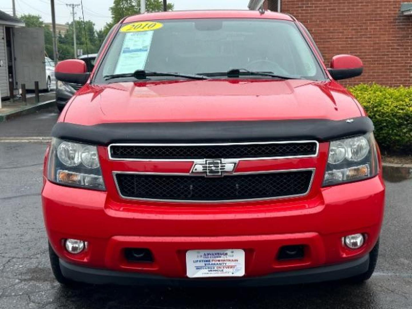 2010 Victory Red Chevrolet Avalanche LT 4WD (3GNVKFE09AG) with an 5.3L V8 OHV 16V FFV engine, 4-Speed Automatic transmission, located at 880 E. National Road, Vandalia, OH, 45377, (937) 908-9800, 39.891918, -84.183594 - Photo#1