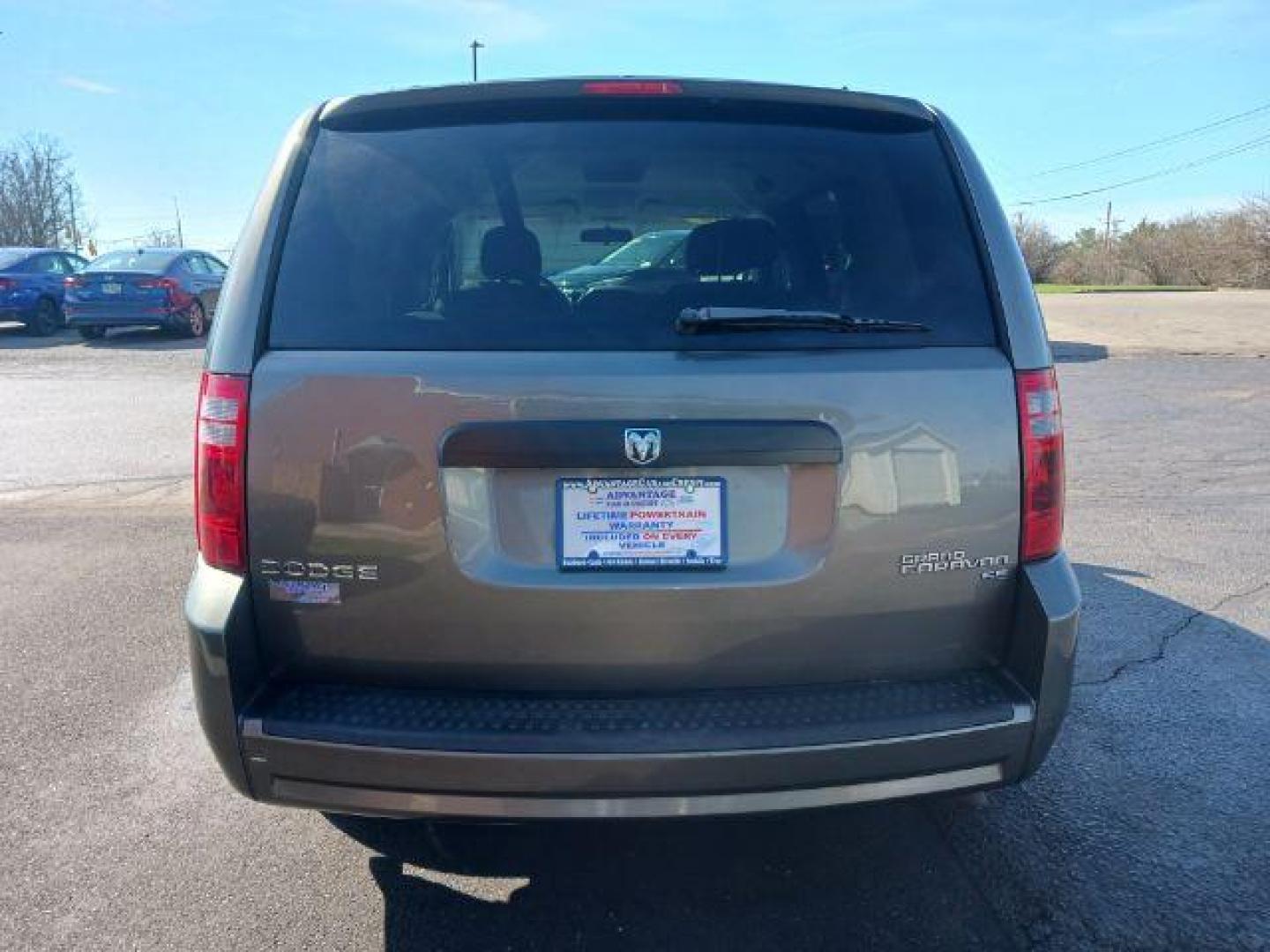 2010 Dark Cordovan Pearl Dodge Grand Caravan Hero (2D4RN3D16AR) with an 3.8L V6 OHV 12V engine, 6-Speed Automatic transmission, located at 4508 South Dixie Dr, Moraine, OH, 45439, (937) 908-9800, 39.689976, -84.218452 - Photo#5