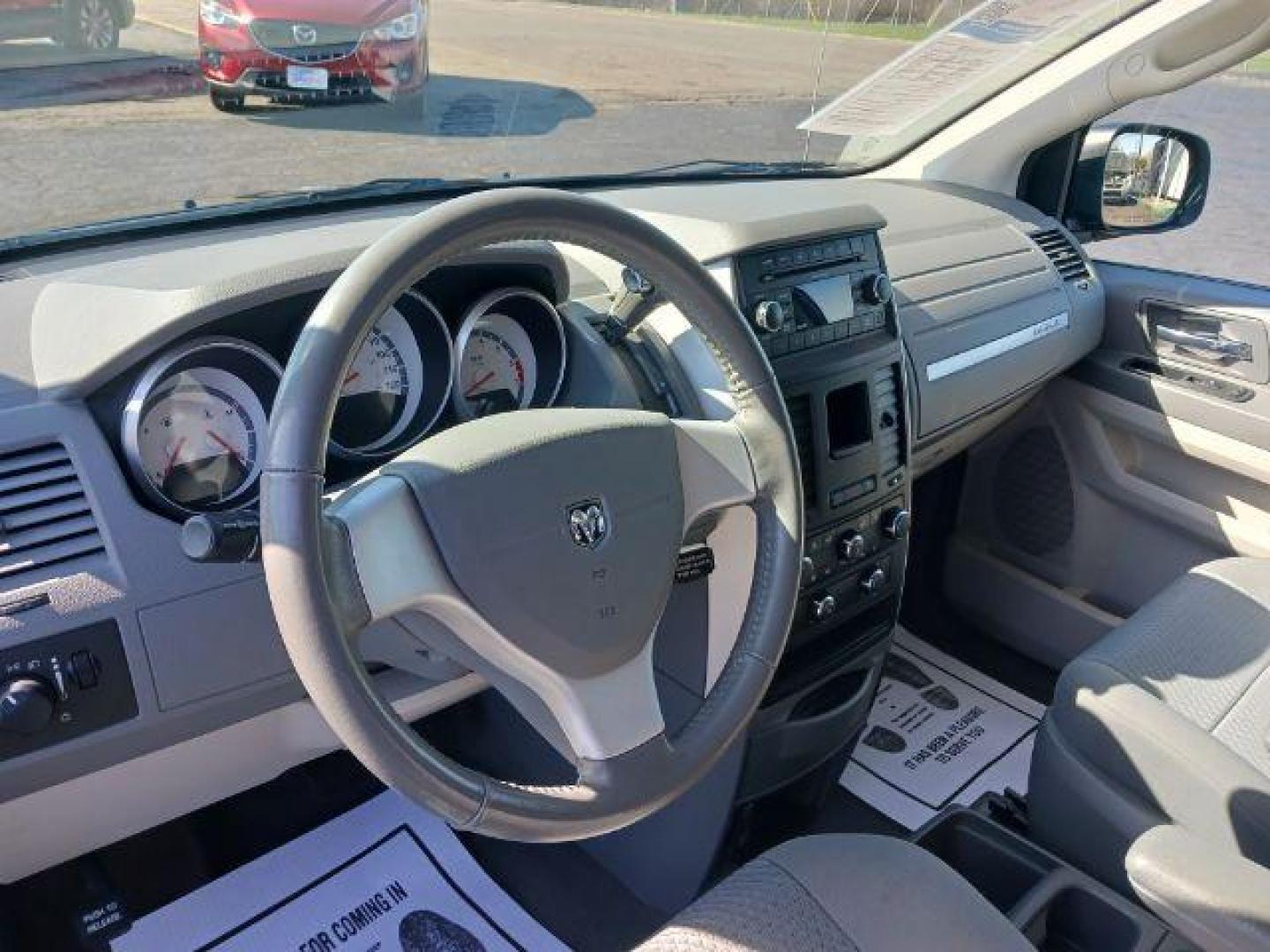 2010 Dark Cordovan Pearl Dodge Grand Caravan Hero (2D4RN3D16AR) with an 3.8L V6 OHV 12V engine, 6-Speed Automatic transmission, located at 4508 South Dixie Dr, Moraine, OH, 45439, (937) 908-9800, 39.689976, -84.218452 - Photo#6