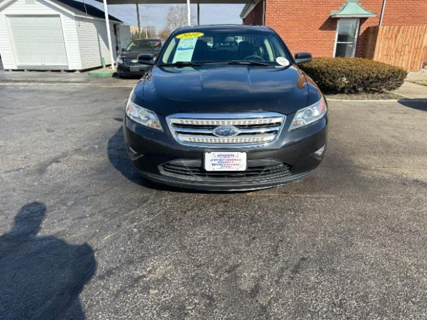 2010 Tuxedo Black Metallic Ford Taurus SEL FWD (1FAHP2EW5AG) with an 3.5L V6 DOHC 24V engine, 6-Speed Automatic transmission, located at 1099 N County Rd 25A, Troy, OH, 45373, (937) 908-9800, 40.057079, -84.212883 - Photo#1