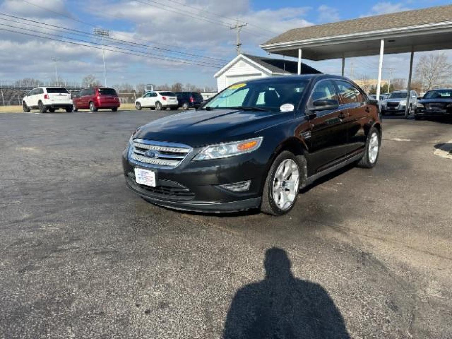 2010 Tuxedo Black Metallic Ford Taurus SEL FWD (1FAHP2EW5AG) with an 3.5L V6 DOHC 24V engine, 6-Speed Automatic transmission, located at 1099 N County Rd 25A, Troy, OH, 45373, (937) 908-9800, 40.057079, -84.212883 - Photo#2