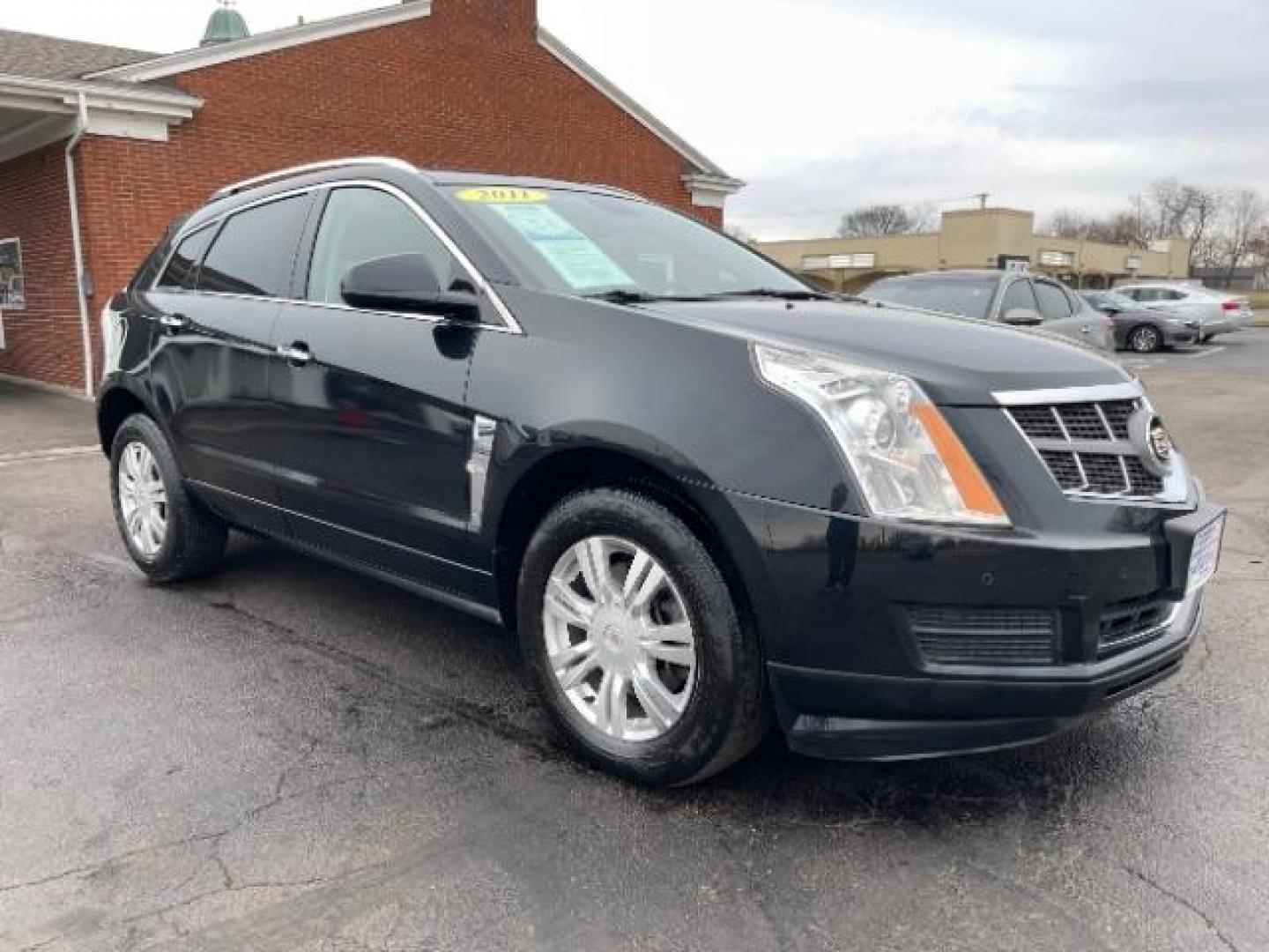 2011 Black Raven Cadillac SRX Luxury Collection AWD (3GYFNDEY3BS) with an 3.0L V6 DOHC 24V engine, 6-Speed Automatic transmission, located at 4508 South Dixie Dr, Moraine, OH, 45439, (937) 908-9800, 39.689976, -84.218452 - Photo#0