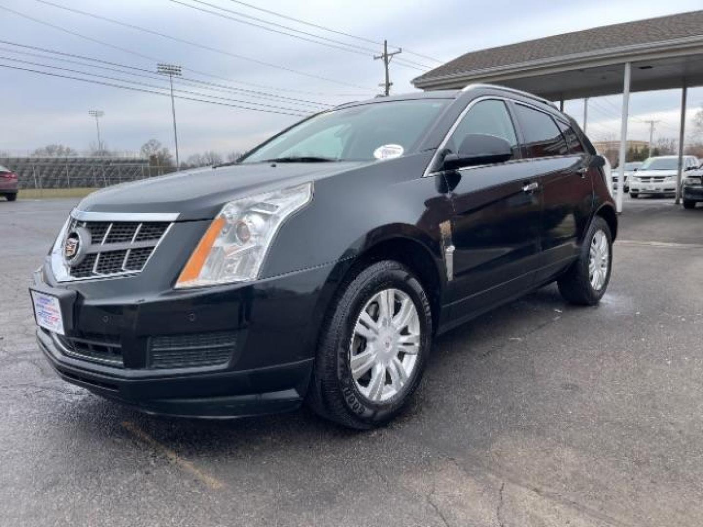 2011 Black Raven Cadillac SRX Luxury Collection AWD (3GYFNDEY3BS) with an 3.0L V6 DOHC 24V engine, 6-Speed Automatic transmission, located at 4508 South Dixie Dr, Moraine, OH, 45439, (937) 908-9800, 39.689976, -84.218452 - Photo#1