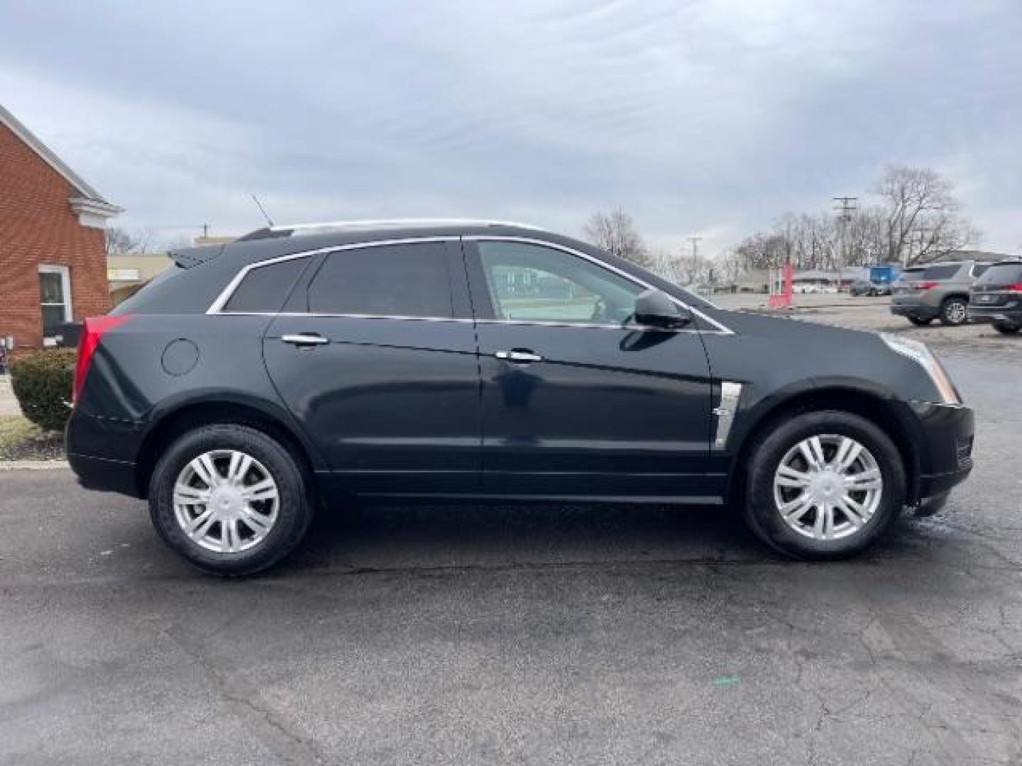 2011 Black Raven Cadillac SRX Luxury Collection AWD (3GYFNDEY3BS) with an 3.0L V6 DOHC 24V engine, 6-Speed Automatic transmission, located at 4508 South Dixie Dr, Moraine, OH, 45439, (937) 908-9800, 39.689976, -84.218452 - Photo#4