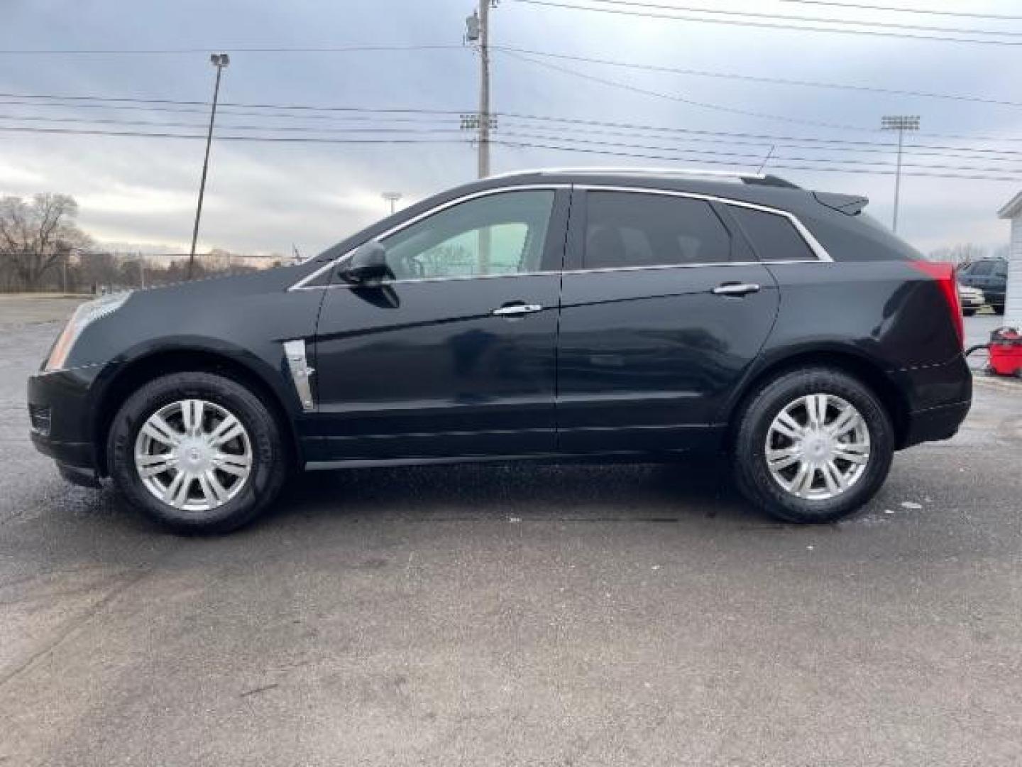 2011 Black Raven Cadillac SRX Luxury Collection AWD (3GYFNDEY3BS) with an 3.0L V6 DOHC 24V engine, 6-Speed Automatic transmission, located at 4508 South Dixie Dr, Moraine, OH, 45439, (937) 908-9800, 39.689976, -84.218452 - Photo#5