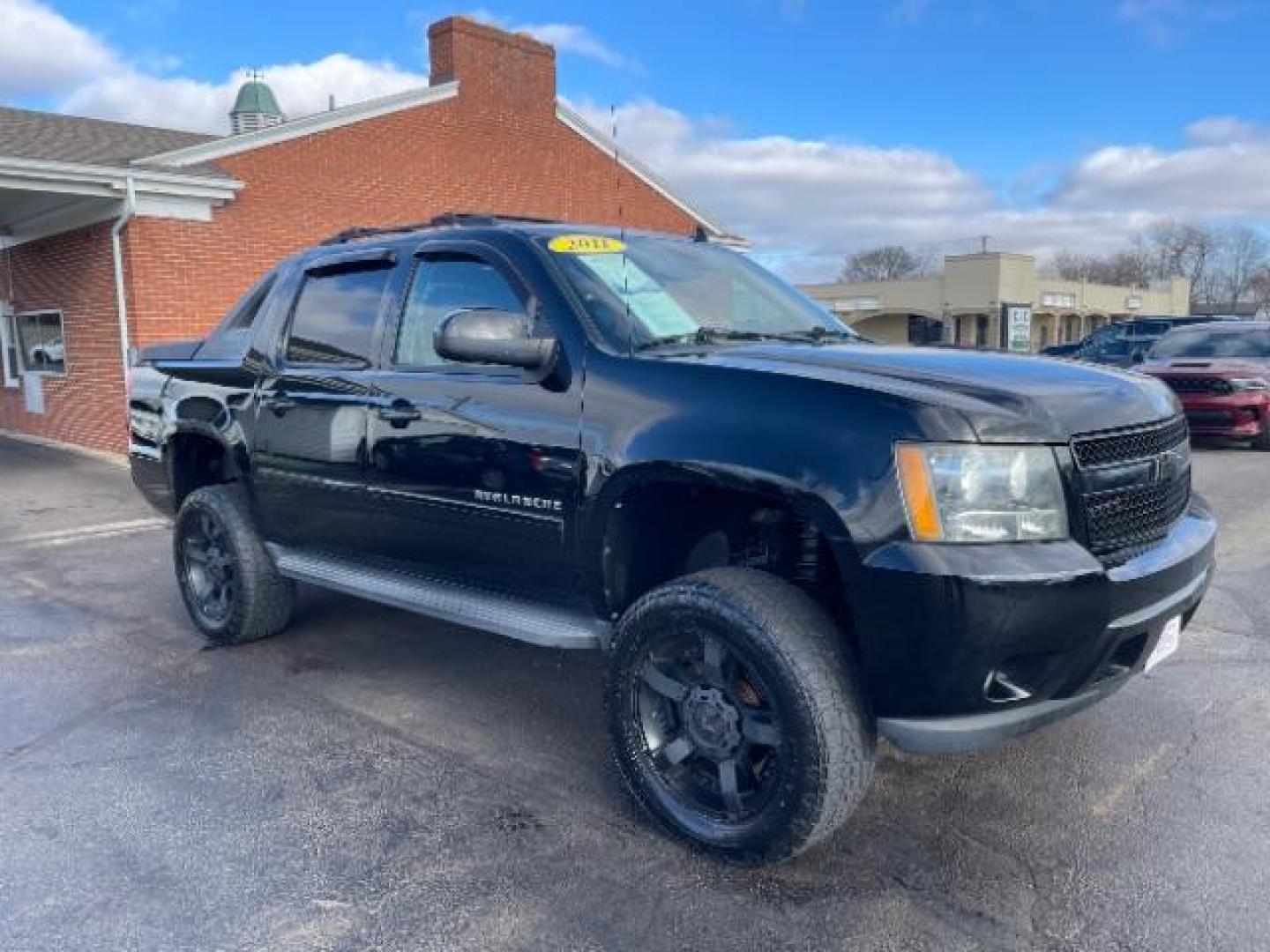 2011 Black Chevrolet Avalanche LTZ 4WD (3GNTKGE30BG) with an 5.3L V8 OHV 16V FFV engine, 4-Speed Automatic transmission, located at 401 Woodman Dr, Riverside, OH, 45431, (937) 908-9800, 39.760899, -84.123421 - Photo#0