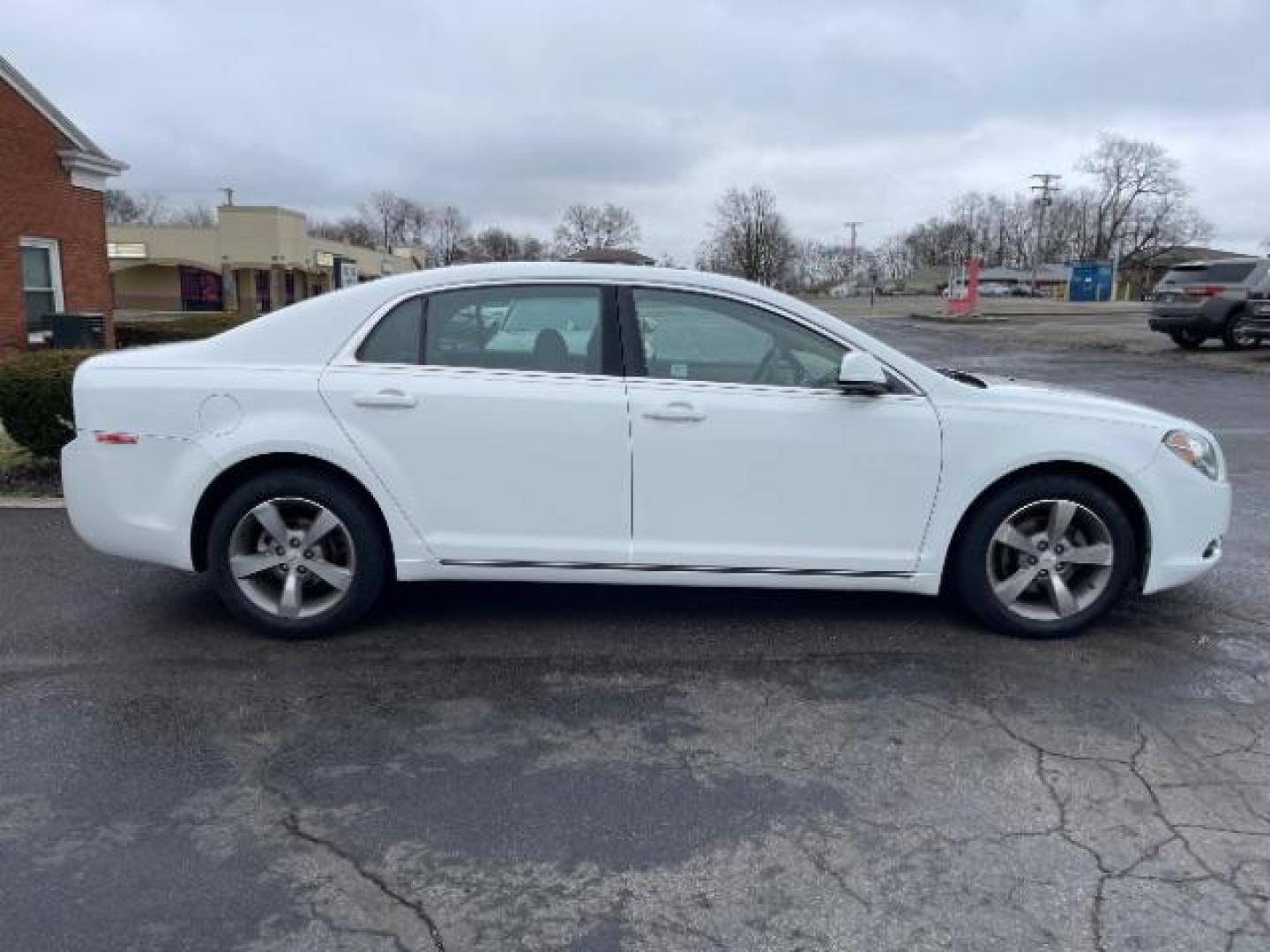 2011 Summit White Chevrolet Malibu 1LT (1G1ZC5E14BF) with an 2.4L L4 DOHC 16V engine, 6-Speed Automatic transmission, located at 880 E. National Road, Vandalia, OH, 45377, (937) 908-9800, 39.891918, -84.183594 - Photo#3