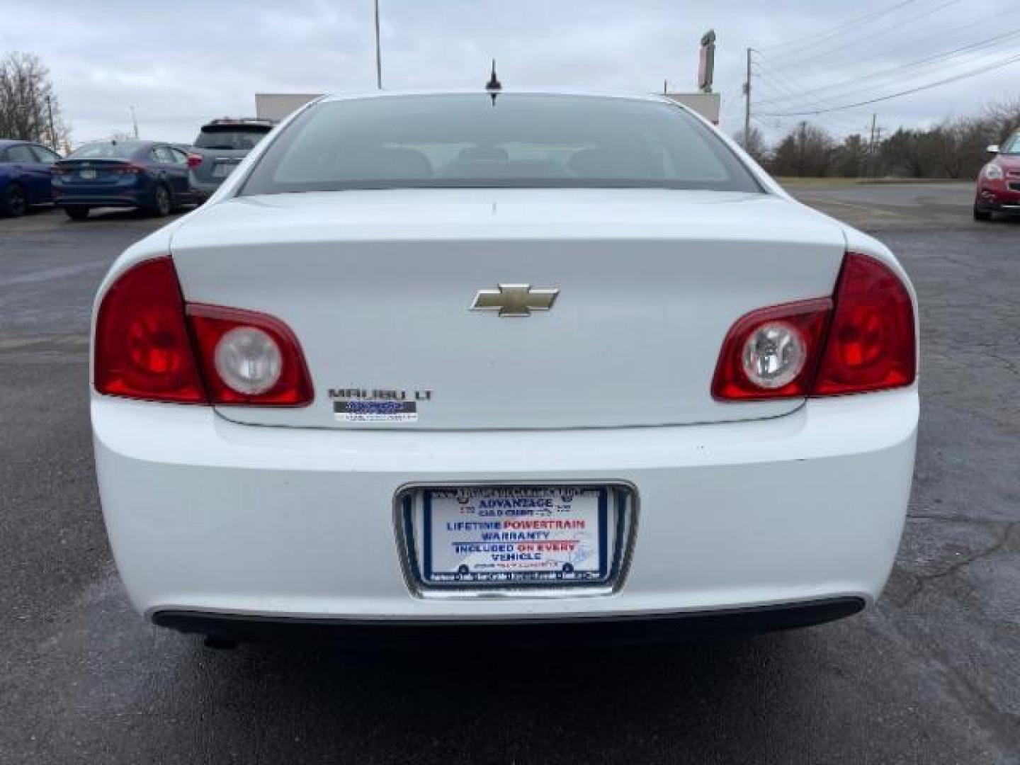 2011 Summit White Chevrolet Malibu 1LT (1G1ZC5E14BF) with an 2.4L L4 DOHC 16V engine, 6-Speed Automatic transmission, located at 880 E. National Road, Vandalia, OH, 45377, (937) 908-9800, 39.891918, -84.183594 - Photo#4