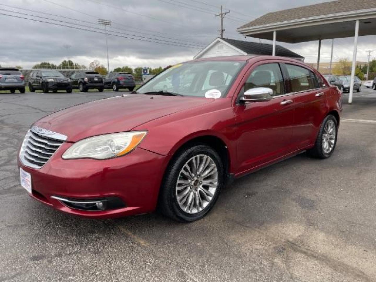 2011 Deep Cherry Red Crystal Pearl Chrysler 200 Limited (1C3BC2FG4BN) with an 3.6L V6 DOHC 24V FFV engine, 6-Speed Automatic transmission, located at 1230 East Main St, Xenia, OH, 45385, (937) 908-9800, 39.688026, -83.910172 - Photo#2