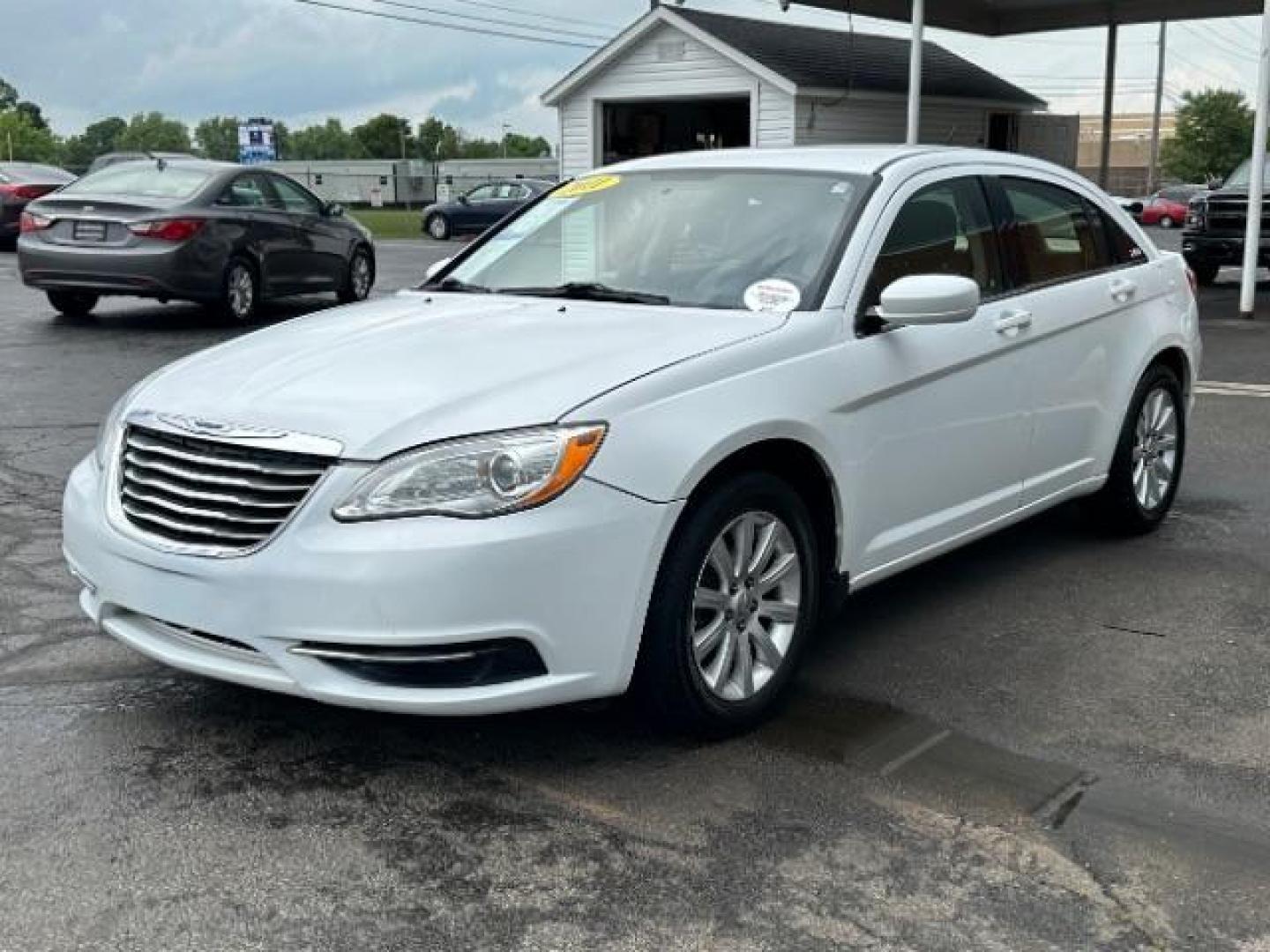 2011 White Gold Chrysler 200 Touring (1C3BC1FB3BN) with an 2.4L L4 DOHC 16V engine, 6-Speed Automatic transmission, located at 880 E. National Road, Vandalia, OH, 45377, (937) 908-9800, 39.891918, -84.183594 - Photo#2