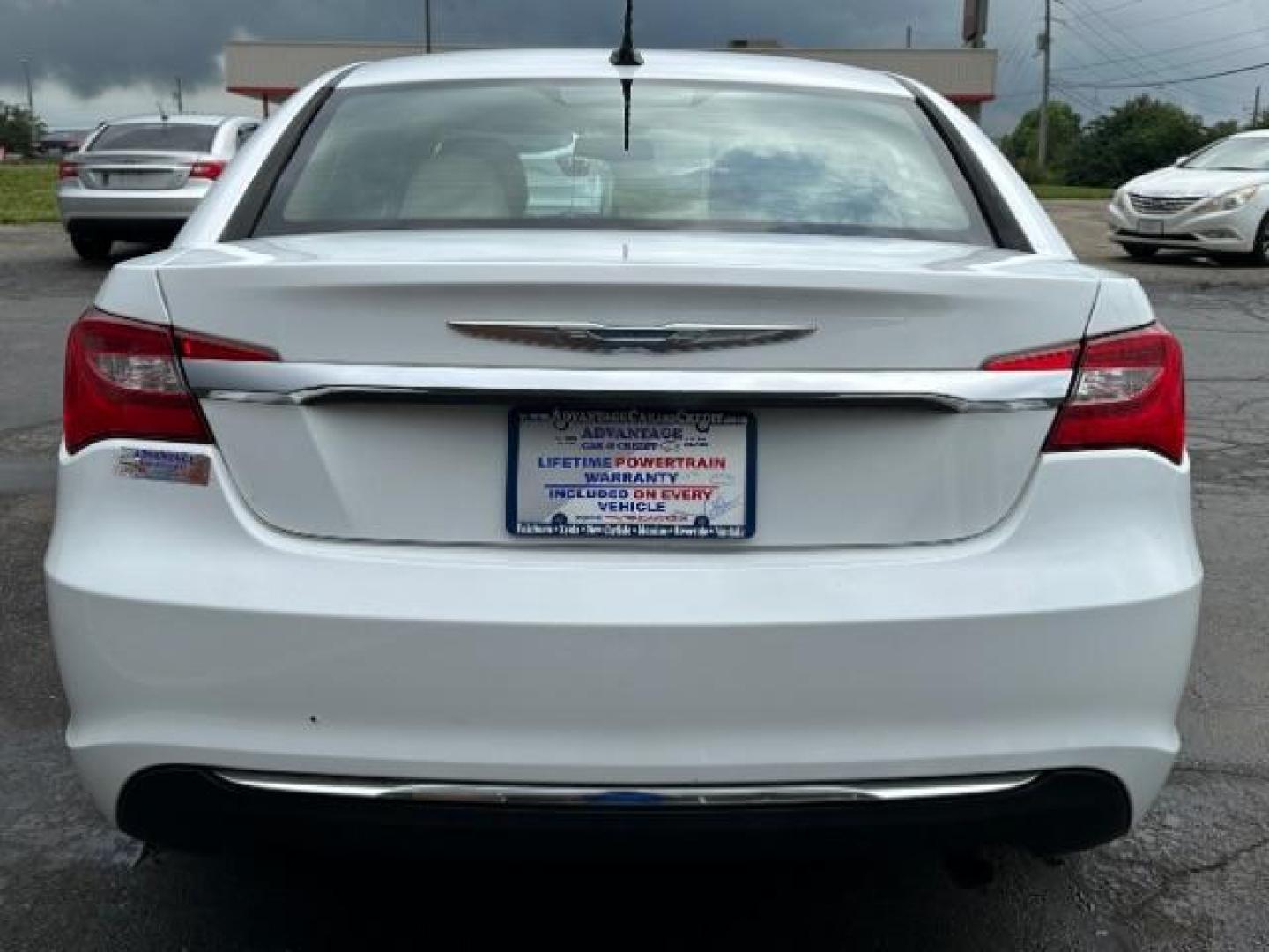 2011 White Gold Chrysler 200 Touring (1C3BC1FB3BN) with an 2.4L L4 DOHC 16V engine, 6-Speed Automatic transmission, located at 880 E. National Road, Vandalia, OH, 45377, (937) 908-9800, 39.891918, -84.183594 - Photo#4