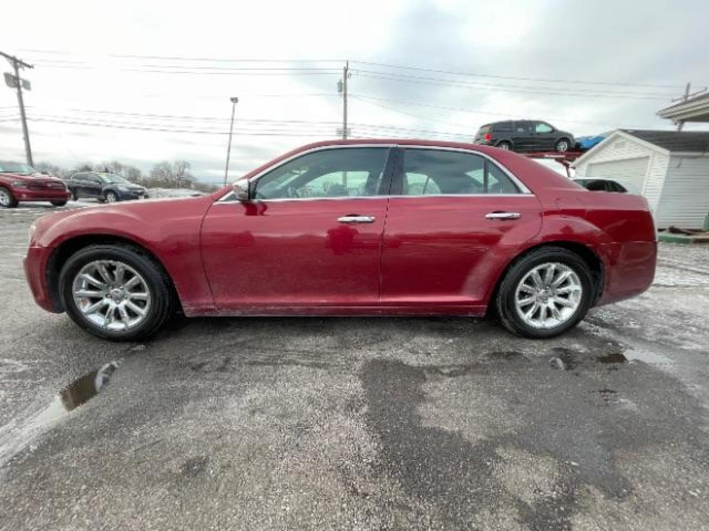 2011 Deep Cherry Red Crystal Pearl Chrysler 300 Limited RWD (2C3CA5CG5BH) with an 3.6L V6 SOHC 24V engine, 5-Speed Automatic transmission, located at 1230 East Main St, Xenia, OH, 45385, (937) 908-9800, 39.688026, -83.910172 - Photo#2