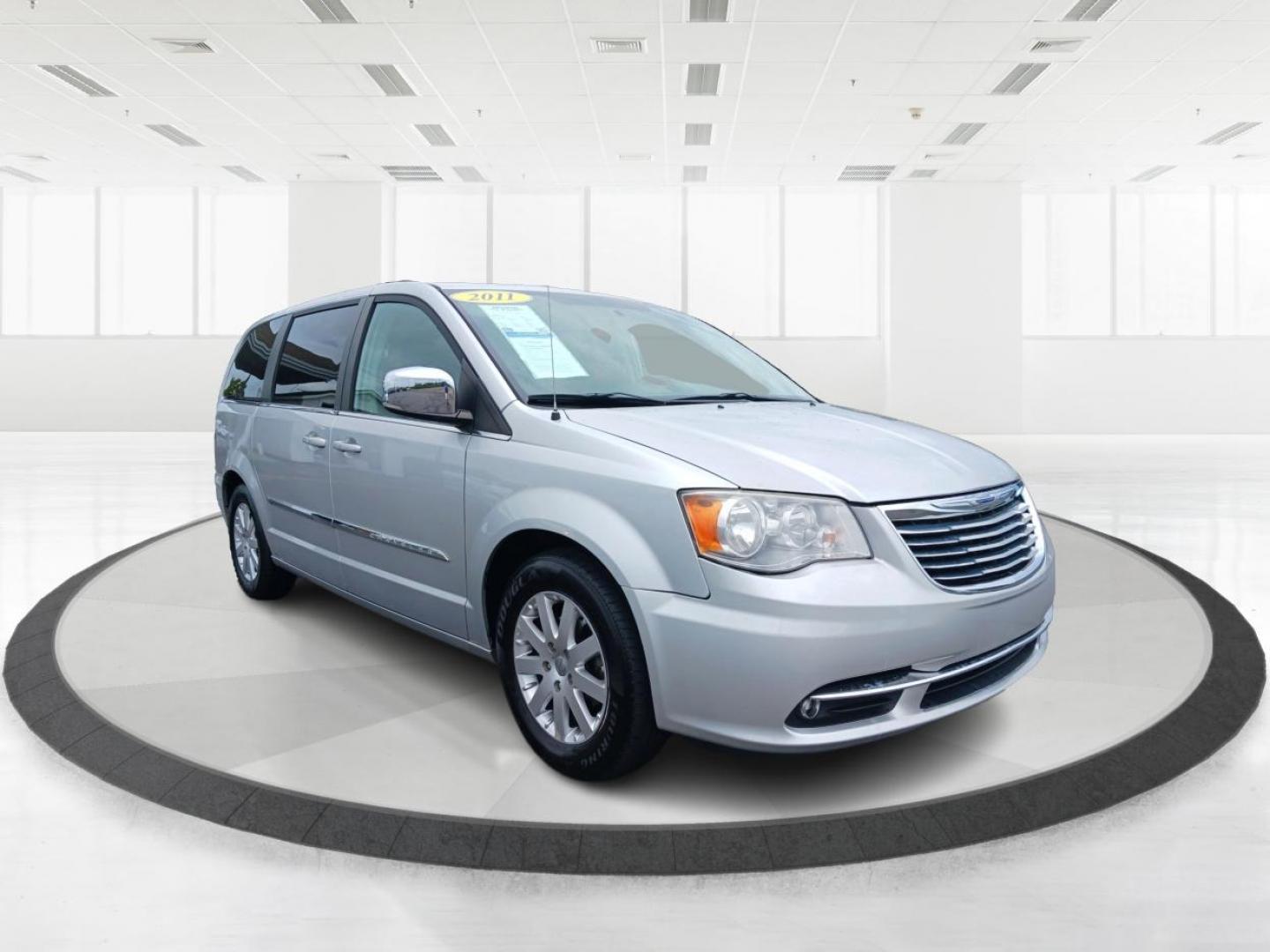 2011 Bright Silver Metallic Chrysler Town and Country Touring-L (2A4RR8DG1BR) with an 3.6L V6 DOHC 24V engine, 6-Speed Automatic transmission, located at 1099 N County Rd 25A, Troy, OH, 45373, (937) 908-9800, 40.057079, -84.212883 - Photo#0