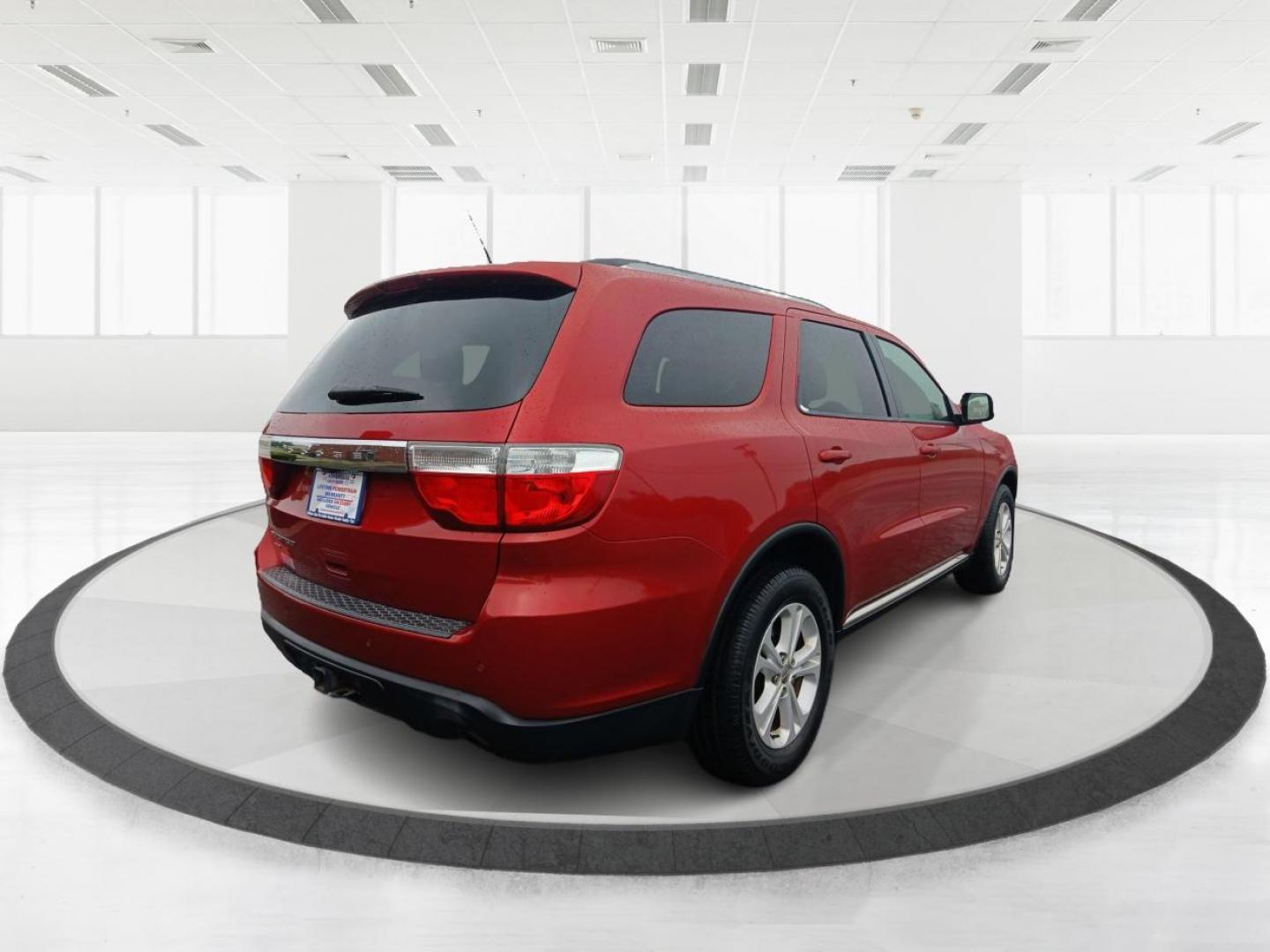 2011 Inferno Red Crystal Pearl Dodge Durango (1D4RE2GG1BC) with an 3.6L V6 DOHC 24V engine, 5-Speed Automatic transmission, located at 1230 East Main St, Xenia, OH, 45385, (937) 908-9800, 39.688026, -83.910172 - Photo#2