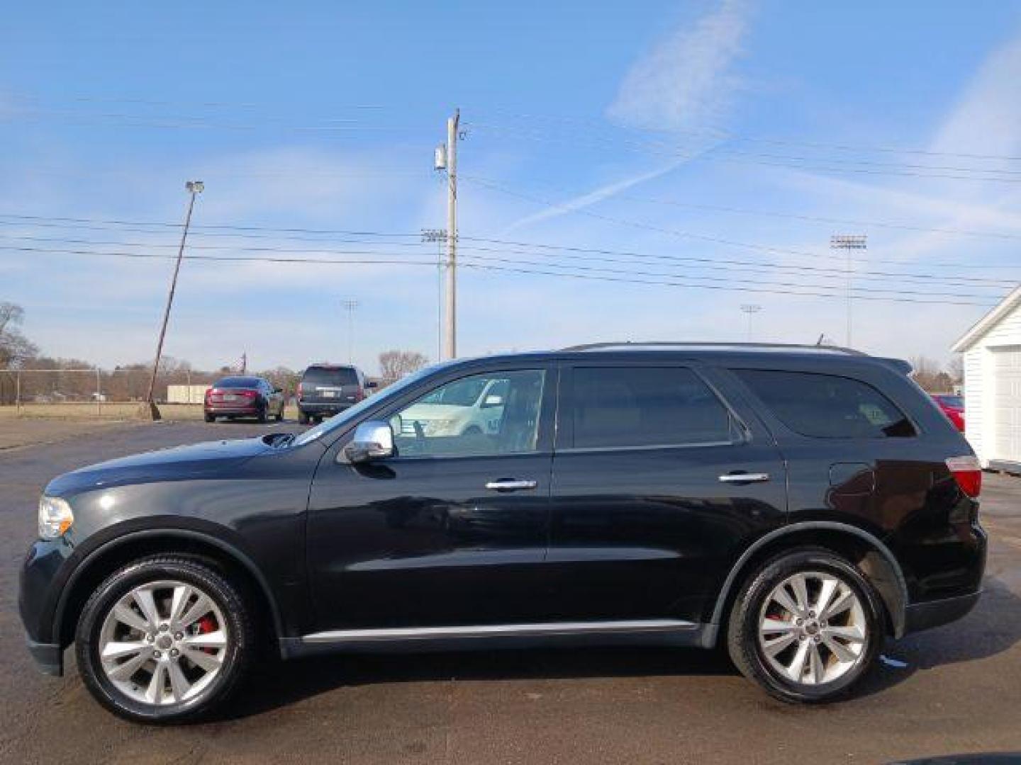 2011 Brilliant Black Crystal Pearl Dodge Durango Crew AWD (1D4SE4GTXBC) with an 5.7L V8 OHV 16V engine, 5-Speed Automatic transmission, located at 1230 East Main St, Xenia, OH, 45385, (937) 908-9800, 39.688026, -83.910172 - Photo#3