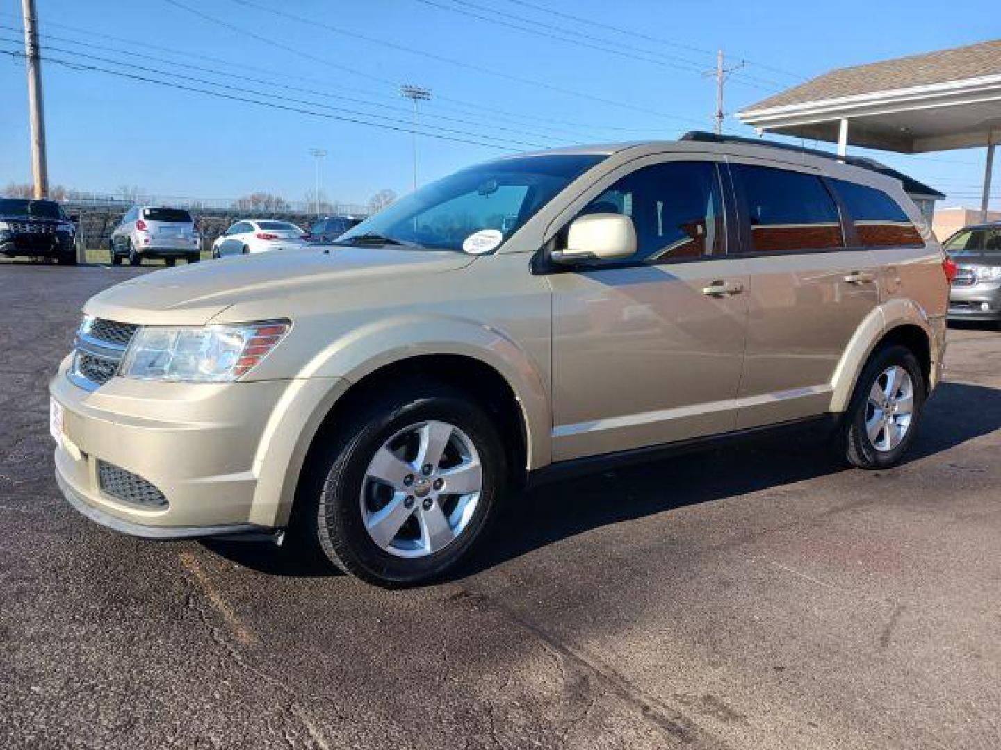 2011 White Gold Dodge Journey Mainstreet (3D4PG1FG9BT) with an 3.6L V6 DOHC 24V engine, 6-Speed Automatic transmission, located at 4508 South Dixie Dr, Moraine, OH, 45439, (937) 908-9800, 39.689976, -84.218452 - Photo#2