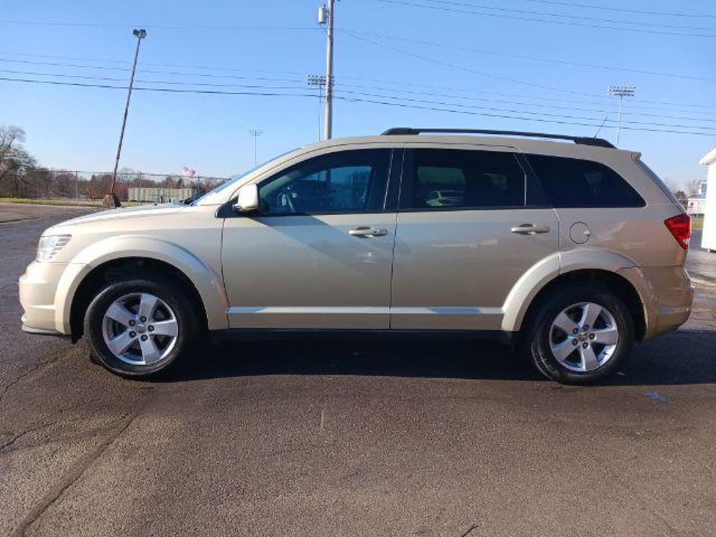 2011 White Gold Dodge Journey Mainstreet (3D4PG1FG9BT) with an 3.6L V6 DOHC 24V engine, 6-Speed Automatic transmission, located at 4508 South Dixie Dr, Moraine, OH, 45439, (937) 908-9800, 39.689976, -84.218452 - Photo#3