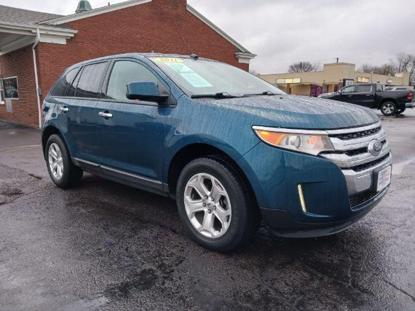 2011 Earth Metallic Ford Edge SEL AWD (2FMDK4JC7BB) with an 3.5L V6 DOHC 24V engine, 6-Speed Automatic transmission, located at 1099 N County Rd 25A, Troy, OH, 45373, (937) 908-9800, 40.057079, -84.212883 - Photo#0