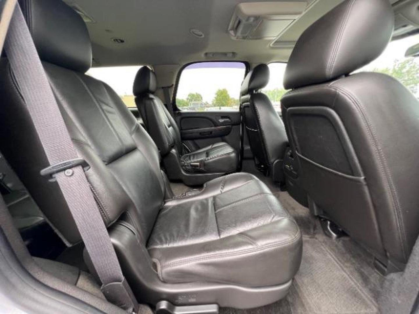 2011 Pure Silver Metallic GMC Yukon SLT1 4WD (1GKS2CE0XBR) with an 5.3L V8 OHV 16V FFV engine, 6-Speed Automatic transmission, located at 401 Woodman Dr, Riverside, OH, 45431, (937) 908-9800, 39.760899, -84.123421 - Third Row - Photo#9