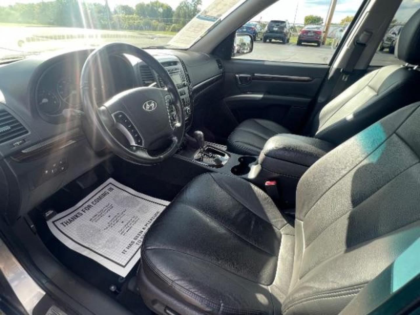 2011 Moonstone Silver Hyundai Santa Fe Limited 3.5 FWD (5XYZK4AG3BG) with an 3.5L V6 DOHC 24V engine, 6-Speed Automatic transmission, located at 1230 East Main St, Xenia, OH, 45385, (937) 908-9800, 39.688026, -83.910172 - Photo#5