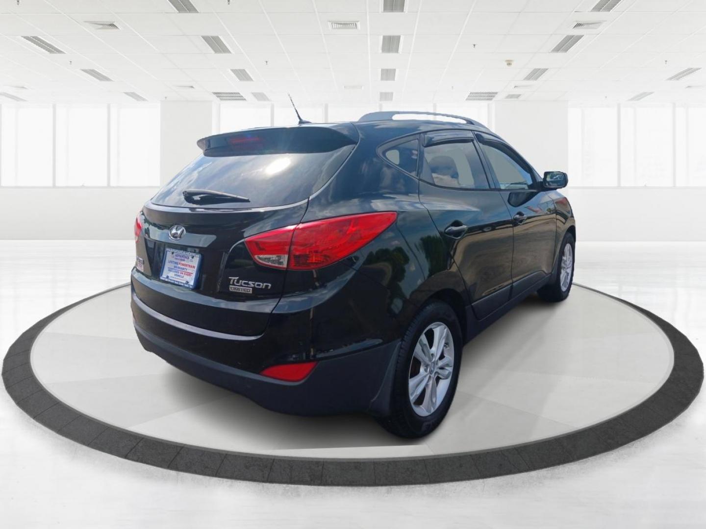 2011 Ash Black Mica Hyundai Tucson (KM8JU3AC8BU) with an 2.4L L4 DOHC 16V engine, 6-Speed Automatic transmission, located at 1099 N County Rd 25A, Troy, OH, 45373, (937) 908-9800, 40.057079, -84.212883 - Photo#2