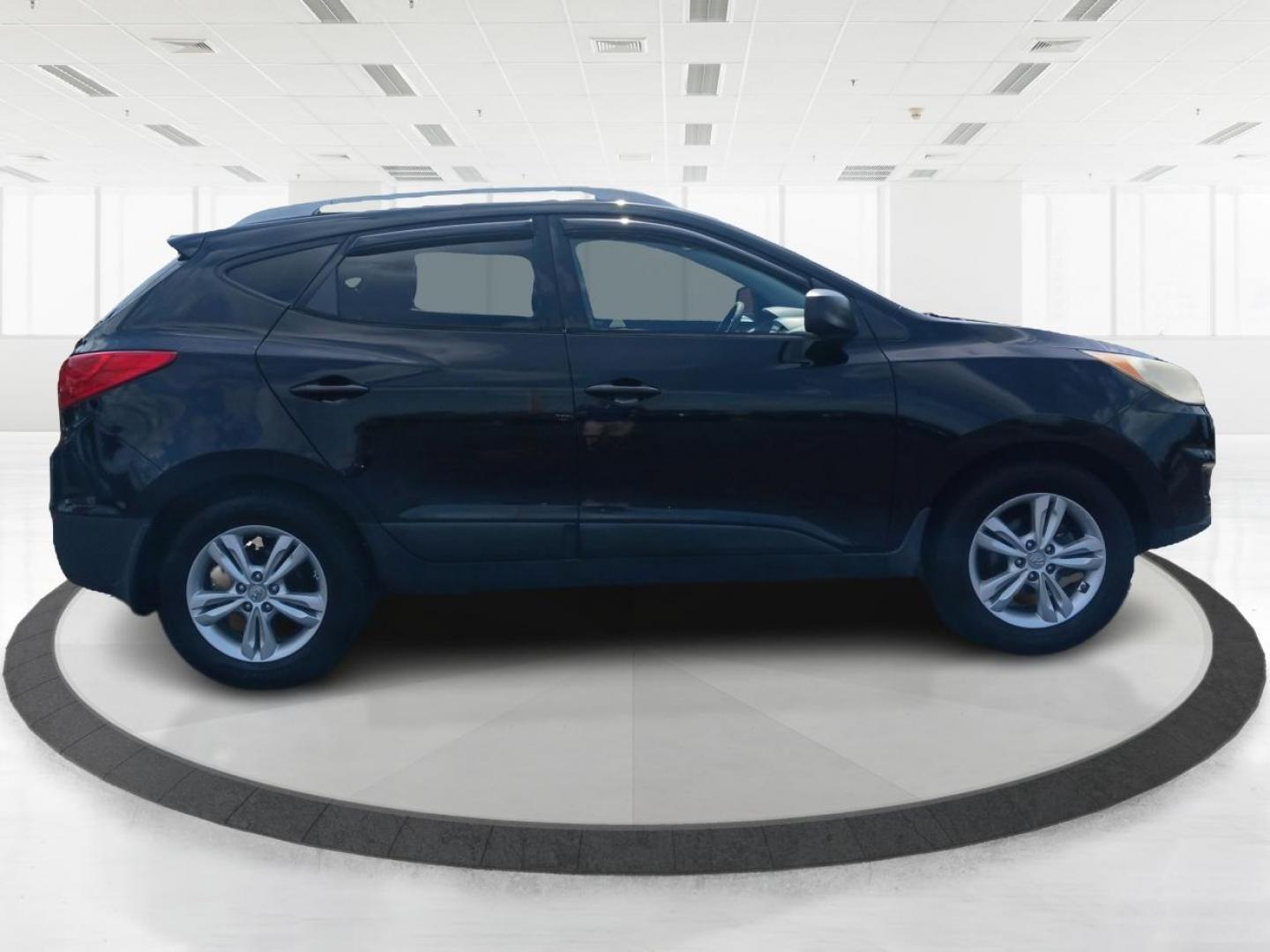 2011 Ash Black Mica Hyundai Tucson (KM8JU3AC8BU) with an 2.4L L4 DOHC 16V engine, 6-Speed Automatic transmission, located at 1099 N County Rd 25A, Troy, OH, 45373, (937) 908-9800, 40.057079, -84.212883 - Photo#1