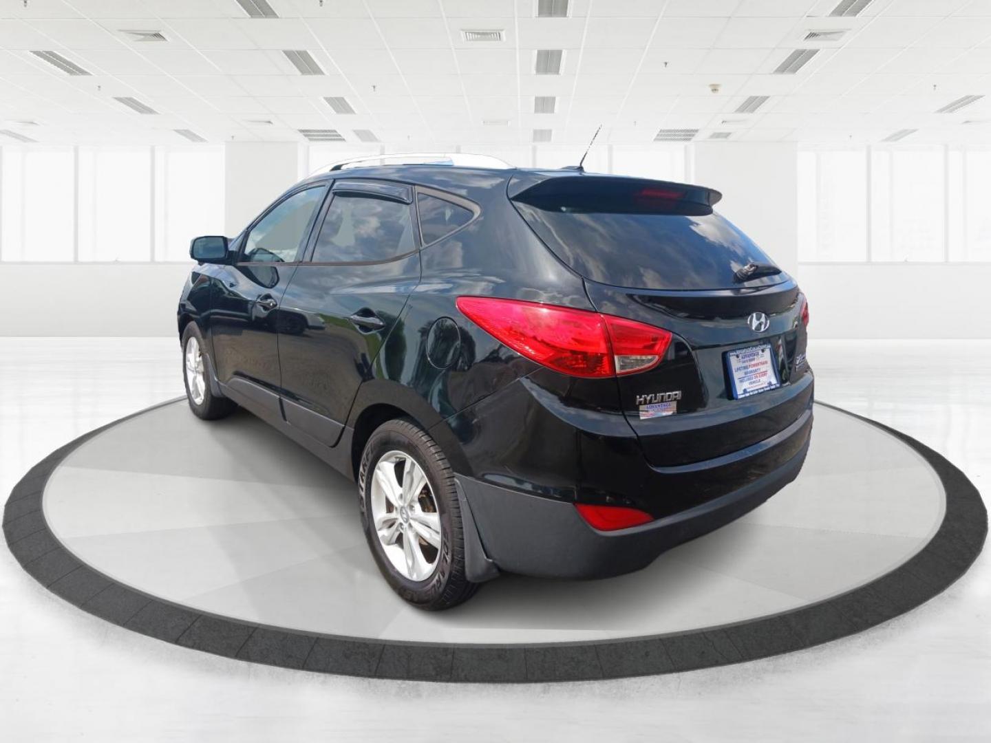 2011 Ash Black Mica Hyundai Tucson (KM8JU3AC8BU) with an 2.4L L4 DOHC 16V engine, 6-Speed Automatic transmission, located at 1099 N County Rd 25A, Troy, OH, 45373, (937) 908-9800, 40.057079, -84.212883 - Photo#4