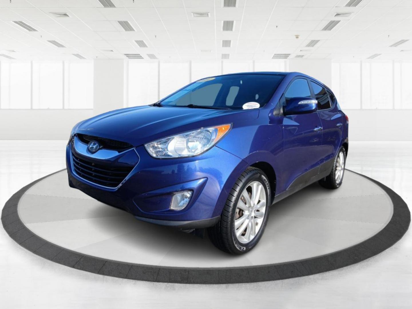 2011 Aurora Blue Metallic Hyundai Tucson (KM8JUCAC1BU) with an 2.4L L4 DOHC 16V engine, 6-Speed Automatic transmission, located at 1230 East Main St, Xenia, OH, 45385, (937) 908-9800, 39.688026, -83.910172 - Photo#7