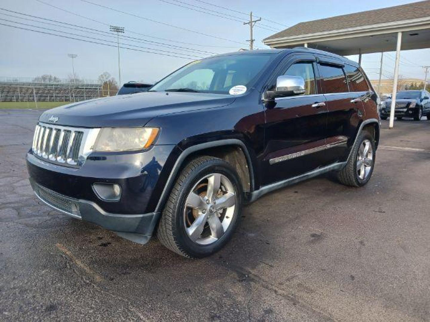 2011 Blue Jeep Grand Cherokee Limited 4WD (1J4RR5GT0BC) with an 5.7L V8 OHV 16V engine, 5-Speed Automatic transmission, located at 401 Woodman Dr, Riverside, OH, 45431, (937) 908-9800, 39.760899, -84.123421 - Photo#2