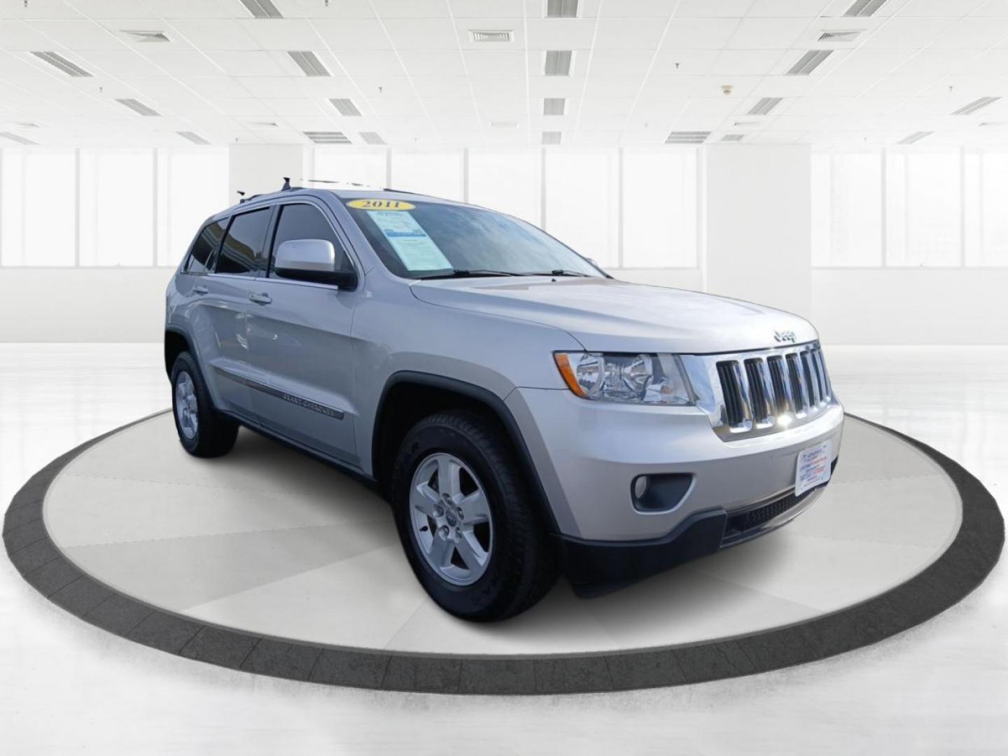 2011 Bright Silver Metallic Jeep Grand Cherokee Laredo 4WD (1J4RR4GG4BC) with an 3.6L V6 DOHC 24V engine, 5-Speed Automatic transmission, located at 1951 S Dayton Lakeview Rd., New Carlisle, OH, 45344, (937) 908-9800, 39.890999, -84.050255 - Photo#0