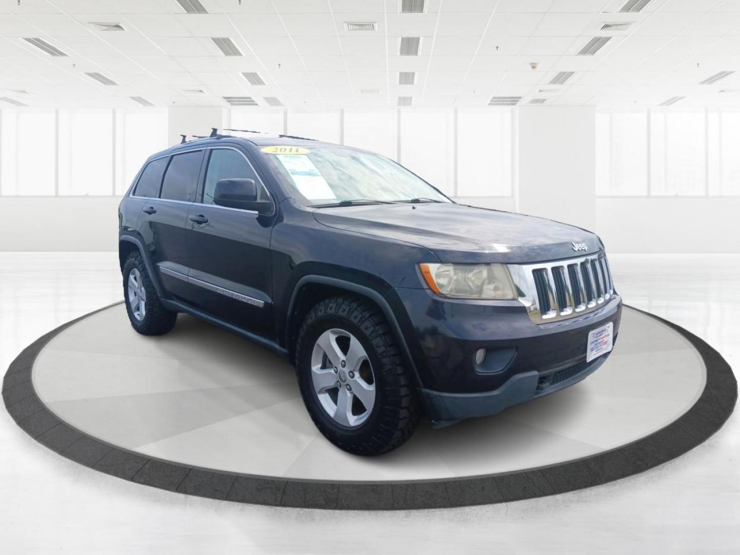 2011 Blue Jeep Grand Cherokee (1J4RR4GT1BC) with an 5.7L V8 OHV 16V engine, 5-Speed Automatic transmission, located at 1184 Kauffman Ave, Fairborn, OH, 45324, (937) 908-9800, 39.807072, -84.030914 - Photo#0