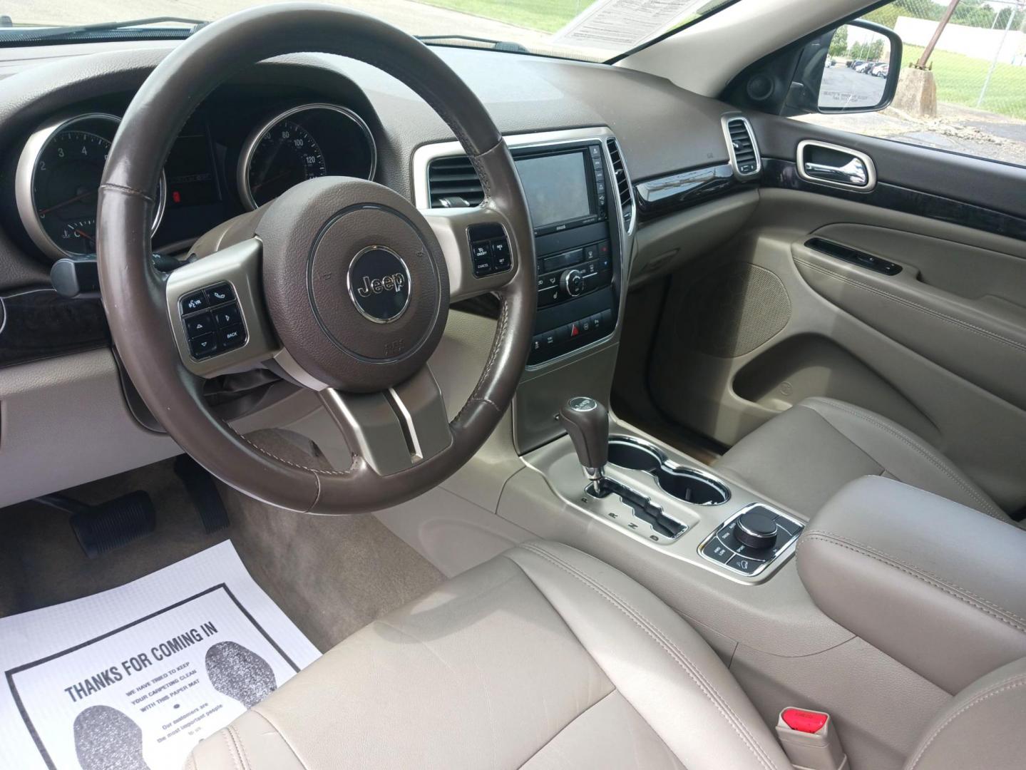 2011 Blue Jeep Grand Cherokee (1J4RR4GT1BC) with an 5.7L V8 OHV 16V engine, 5-Speed Automatic transmission, located at 1184 Kauffman Ave, Fairborn, OH, 45324, (937) 908-9800, 39.807072, -84.030914 - Photo#8