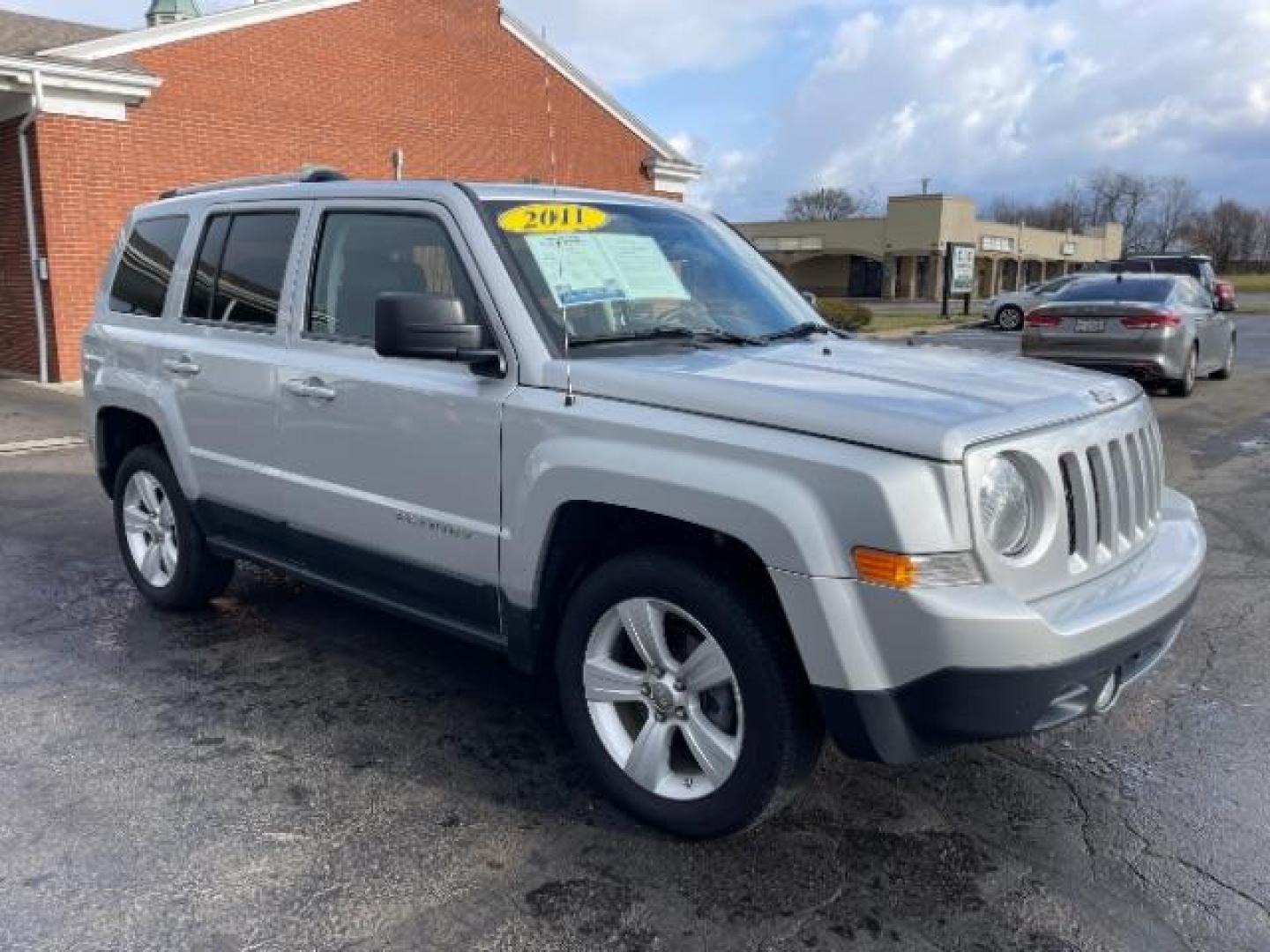 2011 Bright Silver Metallic Jeep Patriot Latitude X 4WD (1J4NF4GB8BD) with an 2.4L L4 DOHC 16V engine, located at 1099 N County Rd 25A, Troy, OH, 45373, (937) 908-9800, 40.057079, -84.212883 - Photo#0