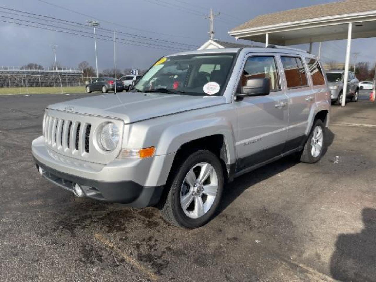 2011 Bright Silver Metallic Jeep Patriot Latitude X 4WD (1J4NF4GB8BD) with an 2.4L L4 DOHC 16V engine, located at 1099 N County Rd 25A, Troy, OH, 45373, (937) 908-9800, 40.057079, -84.212883 - Photo#2