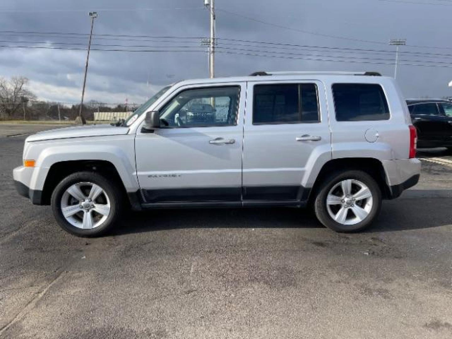 2011 Bright Silver Metallic Jeep Patriot Latitude X 4WD (1J4NF4GB8BD) with an 2.4L L4 DOHC 16V engine, located at 1099 N County Rd 25A, Troy, OH, 45373, (937) 908-9800, 40.057079, -84.212883 - Photo#3