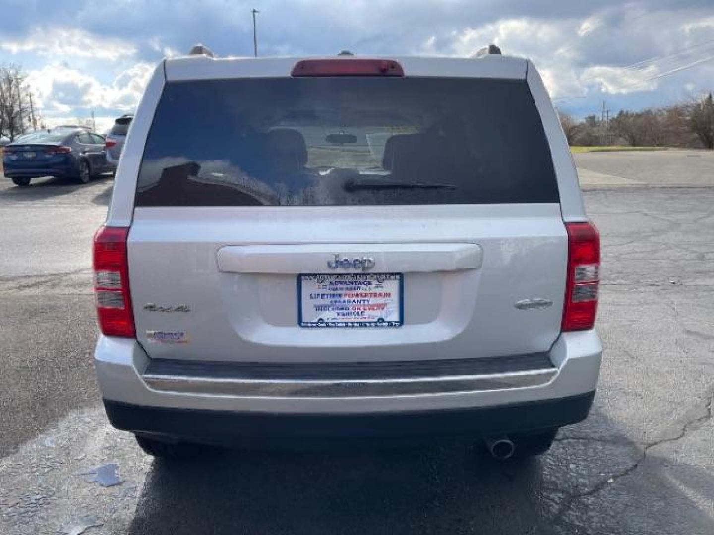 2011 Bright Silver Metallic Jeep Patriot Latitude X 4WD (1J4NF4GB8BD) with an 2.4L L4 DOHC 16V engine, located at 1099 N County Rd 25A, Troy, OH, 45373, (937) 908-9800, 40.057079, -84.212883 - Photo#5