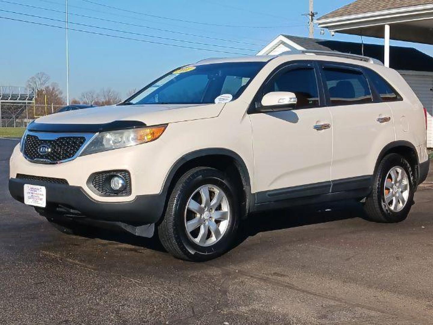 2011 White Sand Beige Kia Sorento LX 2WD (5XYKT4A17BG) with an 2.4L L4 DOHC 16V engine, 6-Speed Automatic transmission, located at 1951 S Dayton Lakeview Rd., New Carlisle, OH, 45344, (937) 908-9800, 39.890999, -84.050255 - Photo#2