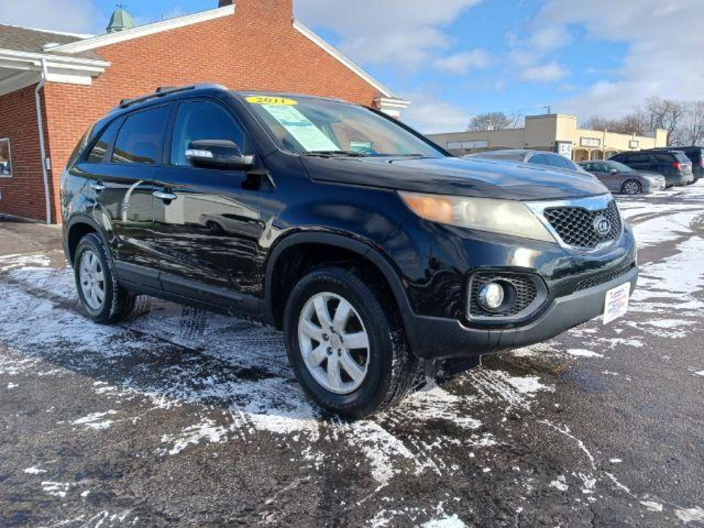 2011 Ebony Black Kia Sorento LX 2WD (5XYKT3A11BG) with an 2.4L L4 DOHC 16V engine, 6-Speed Automatic transmission, located at 1951 S Dayton Lakeview Rd., New Carlisle, OH, 45344, (937) 908-9800, 39.890999, -84.050255 - Photo#0