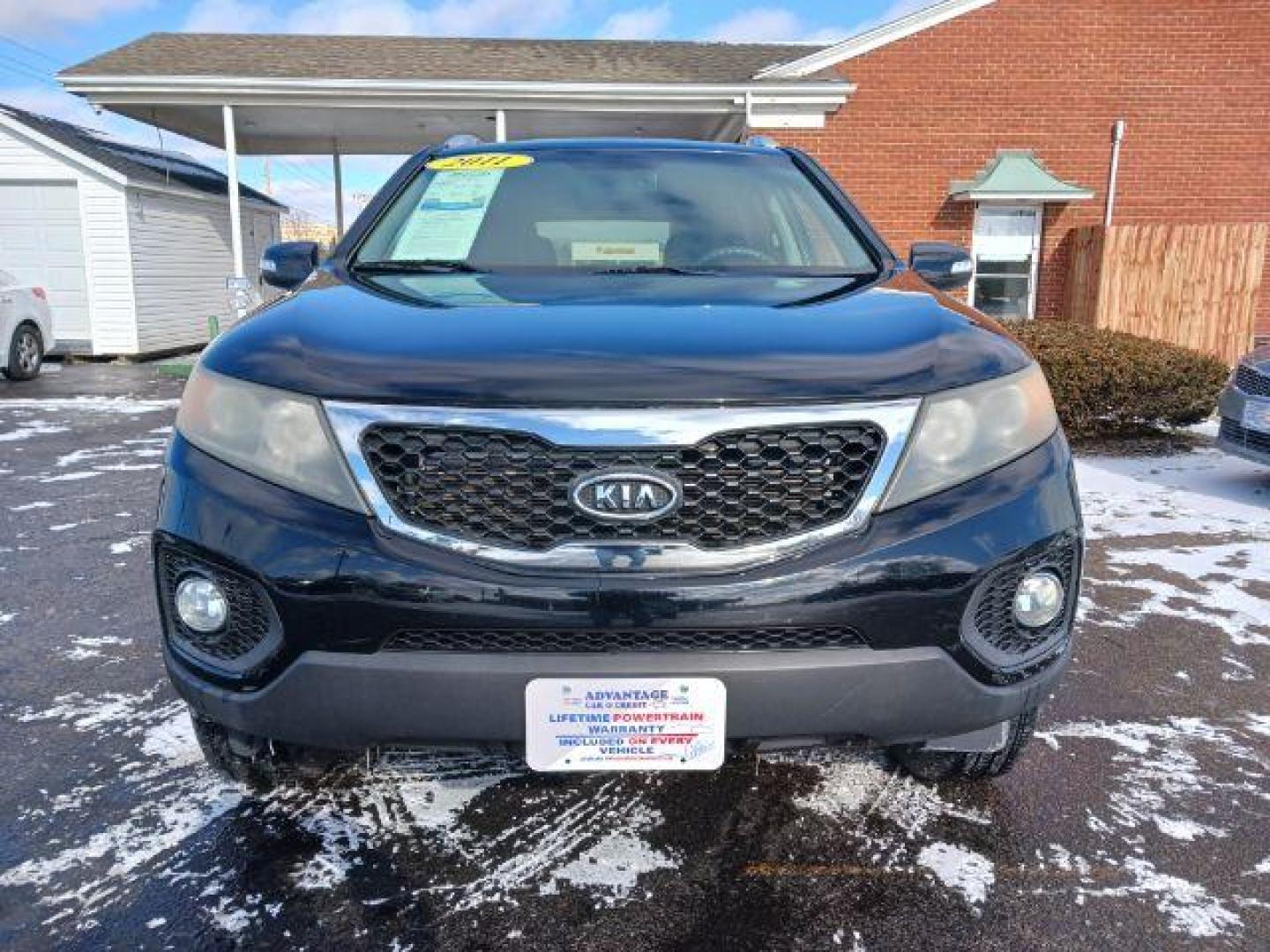 2011 Ebony Black Kia Sorento LX 2WD (5XYKT3A11BG) with an 2.4L L4 DOHC 16V engine, 6-Speed Automatic transmission, located at 1951 S Dayton Lakeview Rd., New Carlisle, OH, 45344, (937) 908-9800, 39.890999, -84.050255 - Photo#1