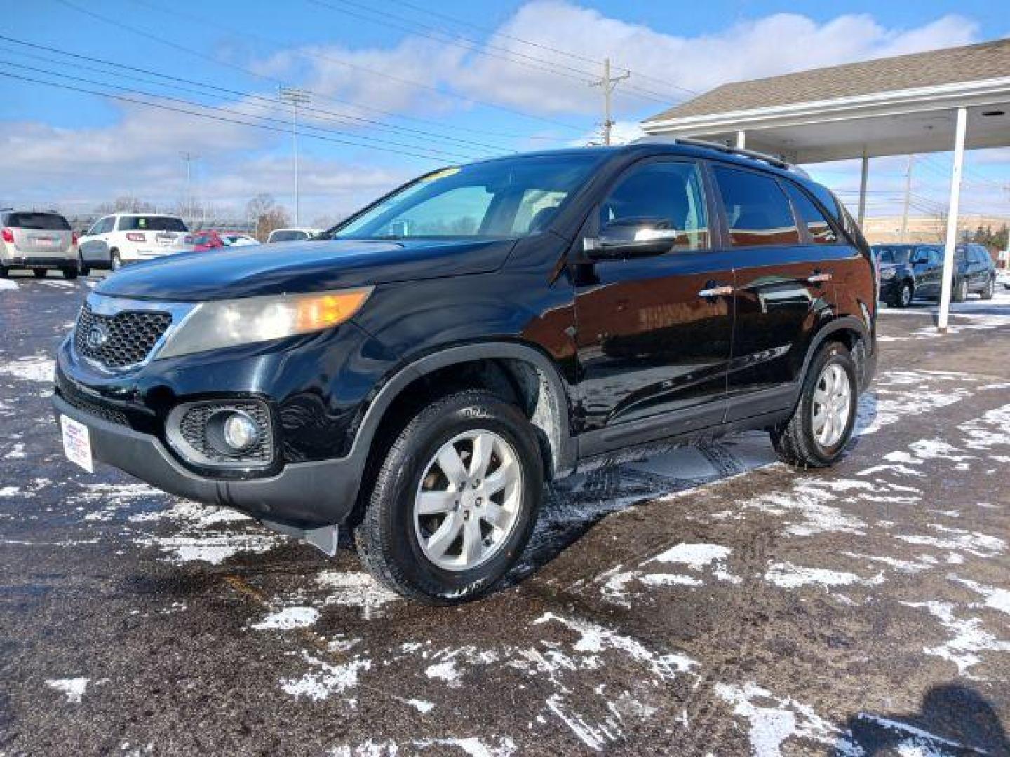 2011 Ebony Black Kia Sorento LX 2WD (5XYKT3A11BG) with an 2.4L L4 DOHC 16V engine, 6-Speed Automatic transmission, located at 1951 S Dayton Lakeview Rd., New Carlisle, OH, 45344, (937) 908-9800, 39.890999, -84.050255 - Photo#2