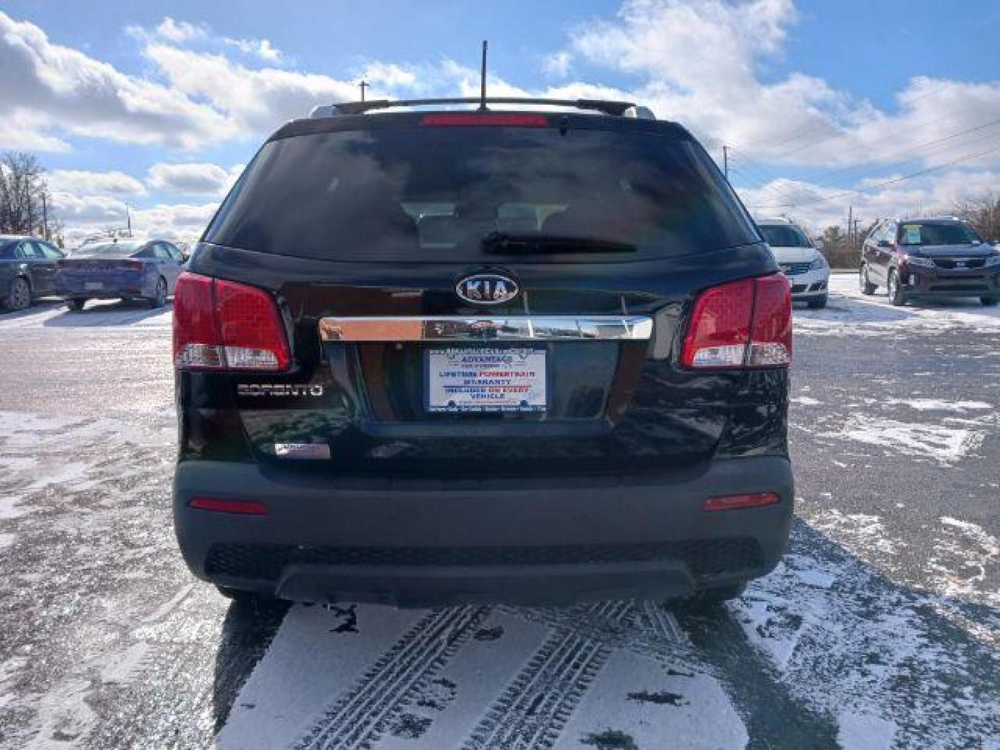 2011 Ebony Black Kia Sorento LX 2WD (5XYKT3A11BG) with an 2.4L L4 DOHC 16V engine, 6-Speed Automatic transmission, located at 1951 S Dayton Lakeview Rd., New Carlisle, OH, 45344, (937) 908-9800, 39.890999, -84.050255 - Photo#5