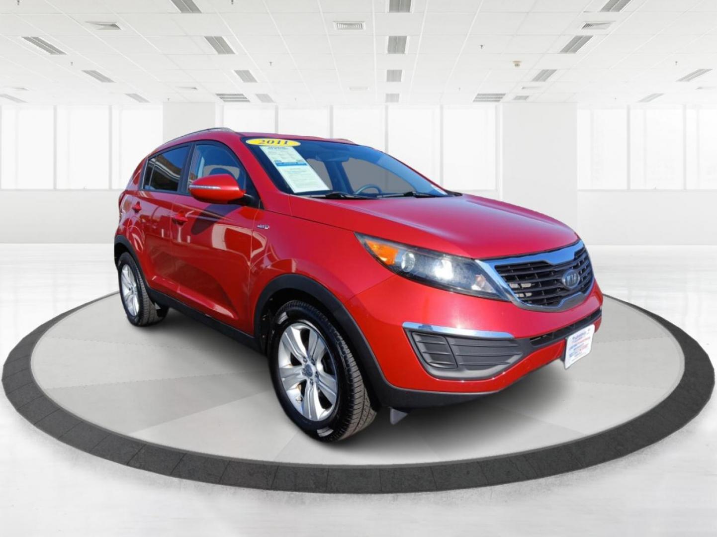 2011 Signal Red Metallic Kia Sportage LX AWD (KNDPBCA29B7) with an 2.4L V6 DOHC 24V engine, 6-Speed Automatic transmission, located at 880 E. National Road, Vandalia, OH, 45377, (937) 908-9800, 39.891918, -84.183594 - Photo#0